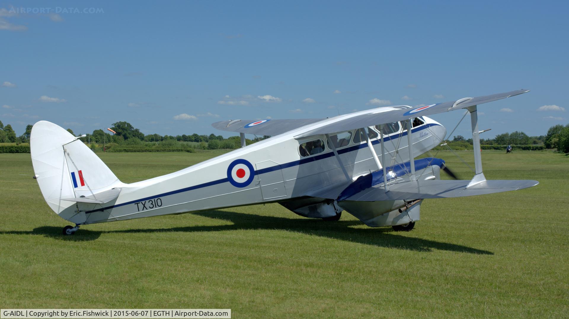 G-AIDL, 1946 De Havilland DH-89A Dominie/Dragon Rapide 6 C/N 6968, 2. TX310 at The Shuttleworth Flying Day and LAA Party in the Park, June 2015.