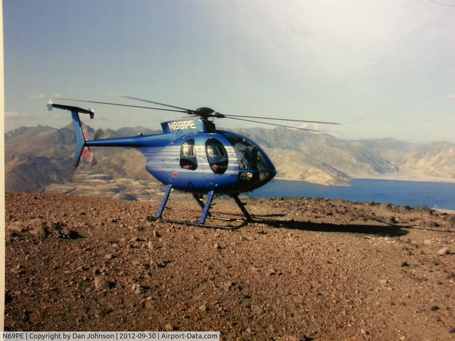 N69PE, 1980 Hughes 369D C/N 1000831D, N69PE in front of the crater of mt st. Helens overlooking spirit lake...helicoper was damaged from a engine failure and hard landing in 2001. Was used for ag operations, external load, flight tours, and ENG for KGW TV Portland Oregon
