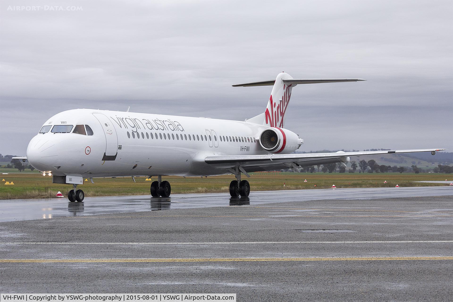 VH-FWI, 1990 Fokker 100 (F-28-0100) C/N 11318, Virgin Australia Regional Airlines (VH-FWI) Fokker 100, now wearing the VA livery, taxiing at Wagga Wagga Airport.