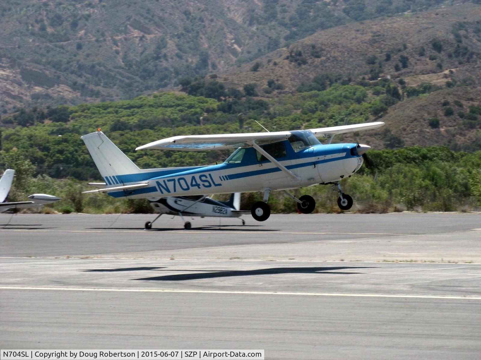 N704SL, 1976 Cessna 150M C/N 15078837, 1976 Cessna 150M, Continental O-200 100 Hp, takeoff climb Rwy 22