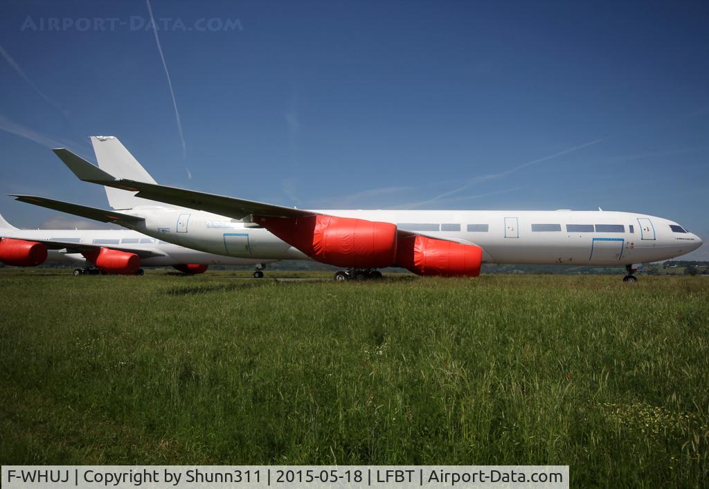 F-WHUJ, Airbus A340-541 C/N 520, C/n 0520 - Stored in all white c/s without titles... Ex. A6-ERD