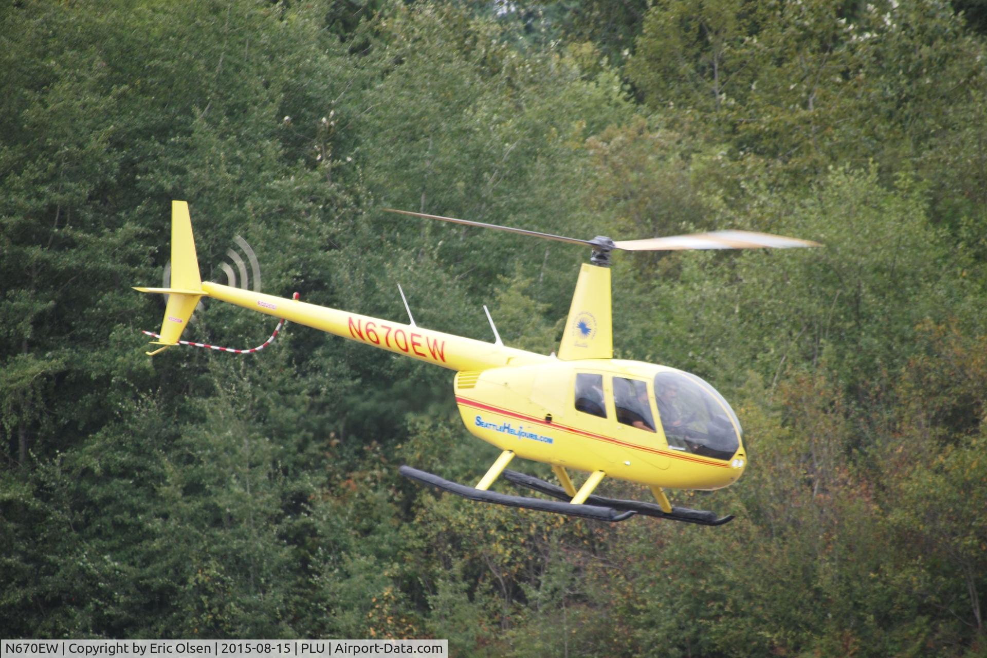 N670EW, Robinson R44 Raven II C/N 12849, Robinson over Thun Field