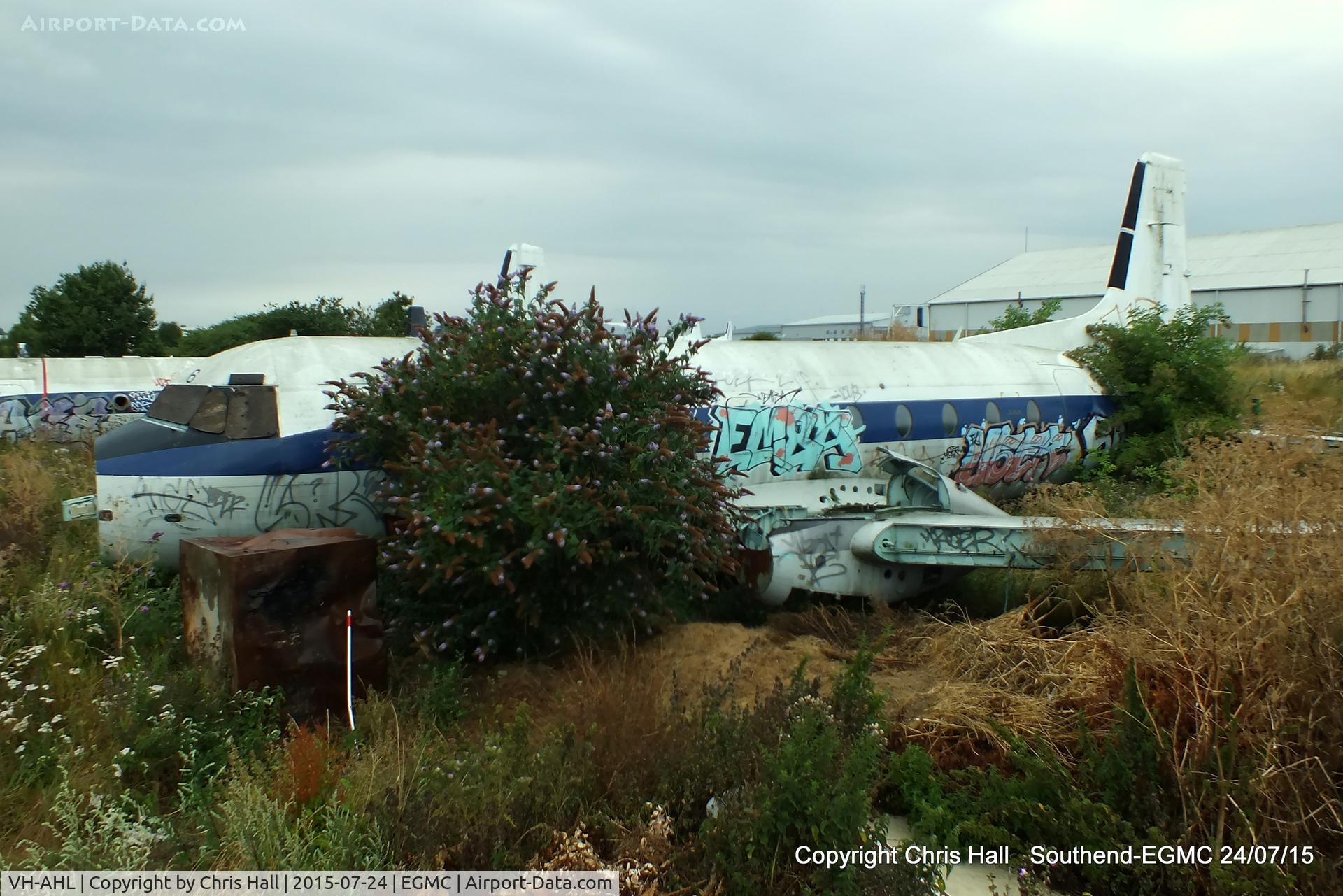 VH-AHL, 1969 Hawker Siddeley HS.748 Series 2 C/N 1606, behind a Hotel next to Southend Airport