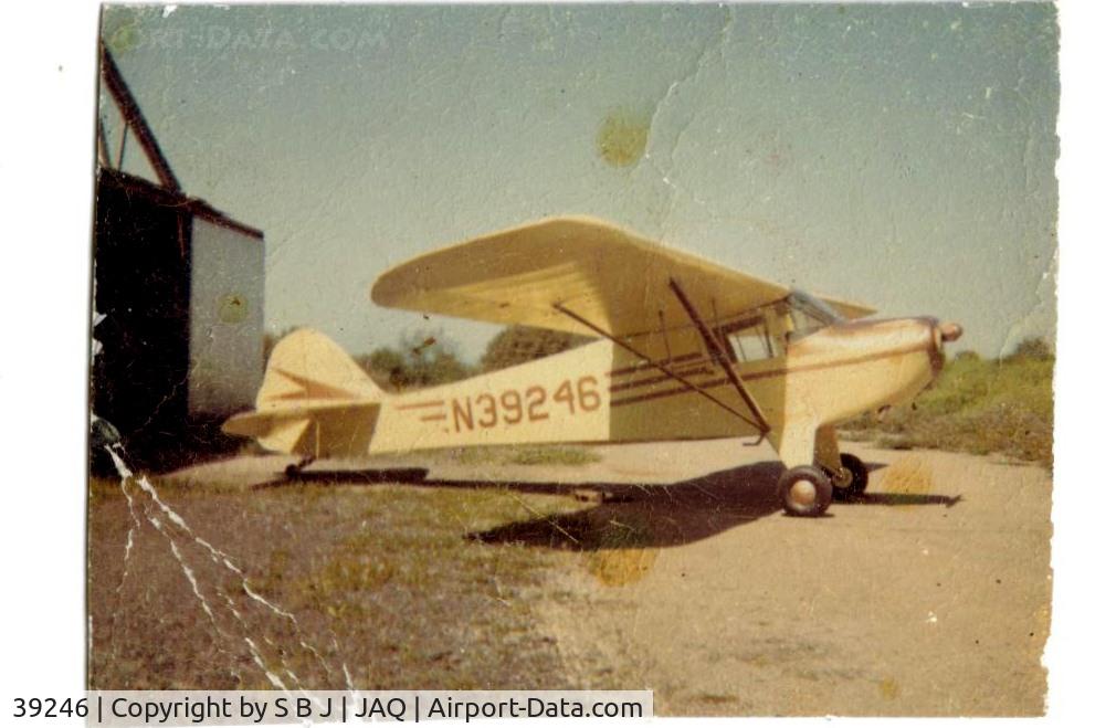 39246, 1945 Taylorcraft BC-12D Twosome C/N 6500, 246 at Westover in 1968-69 after it was recovered by its owner( a Calif Highway Patrolman) who wanted to learn to fly in it,but didnt. It is in front of the very frist hangar built at JAQ and for some time the only one. It was torn down long ago.