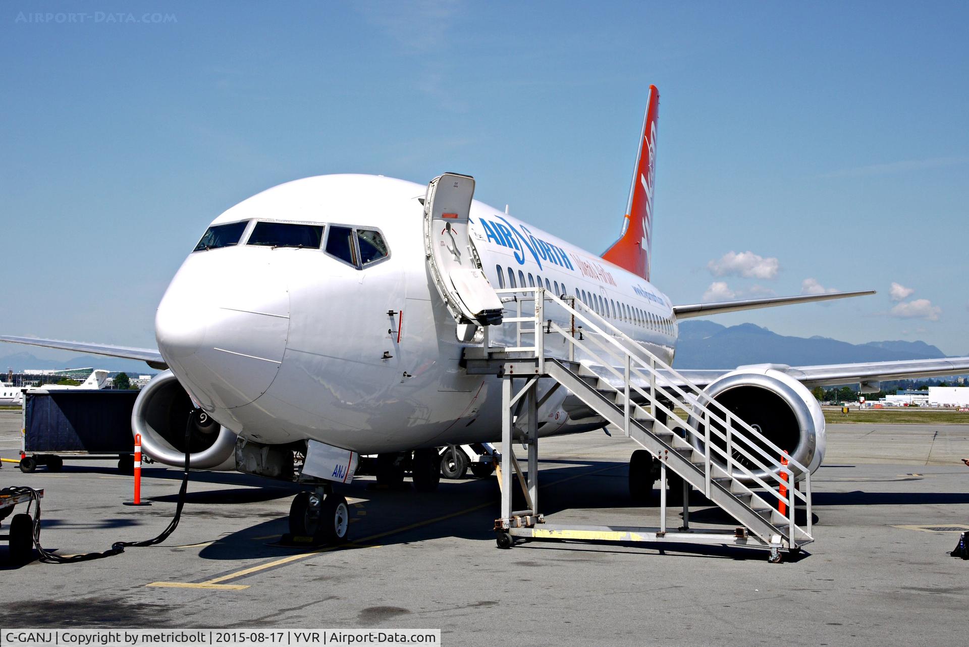 C-GANJ, 1993 Boeing 737-548 C/N 26287, AT YVR South Terminal. No airbridges,just old fashioned steps for de-planing and boarding!