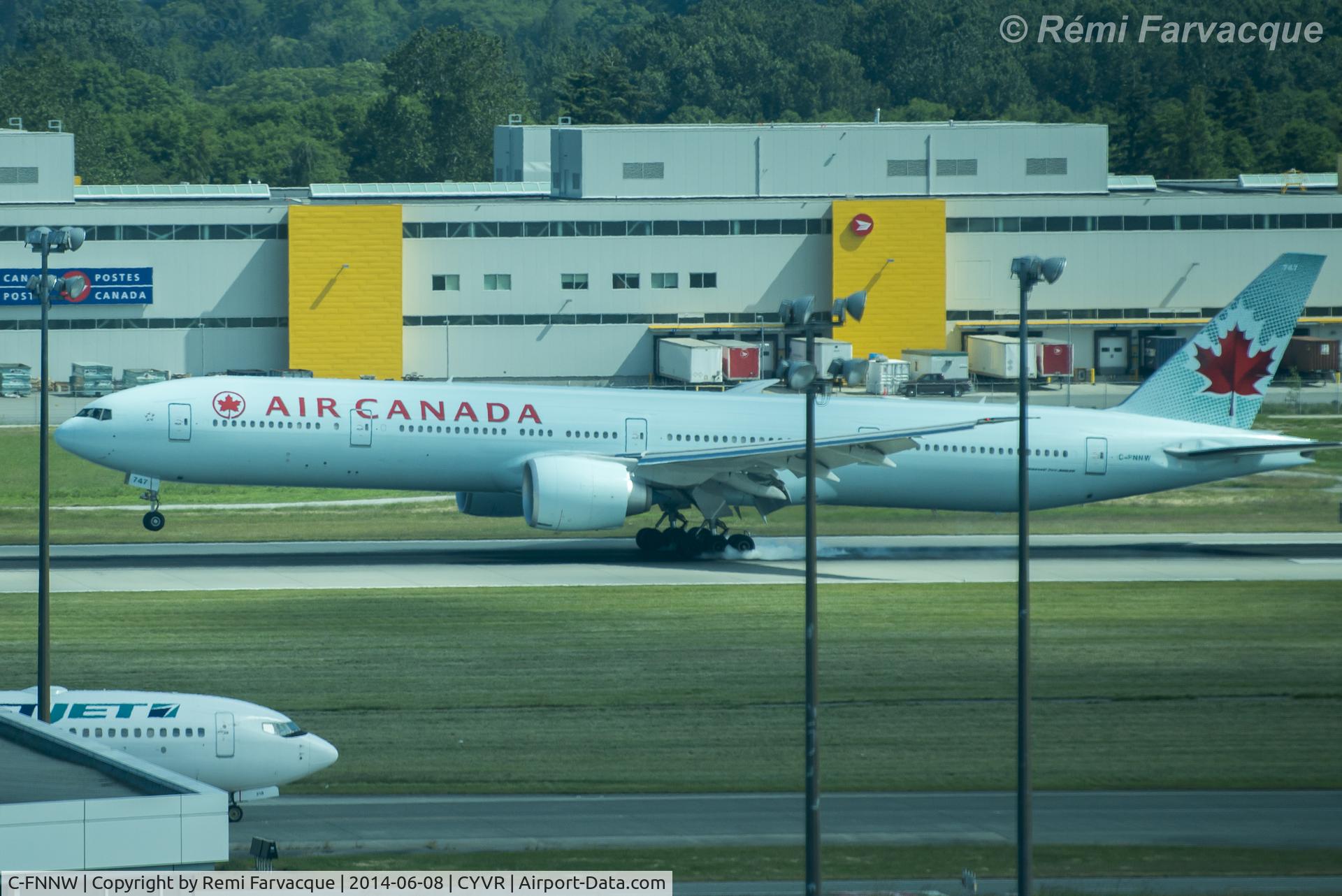 C-FNNW, 2014 Boeing 777-333/ER C/N 43250, Just landing.