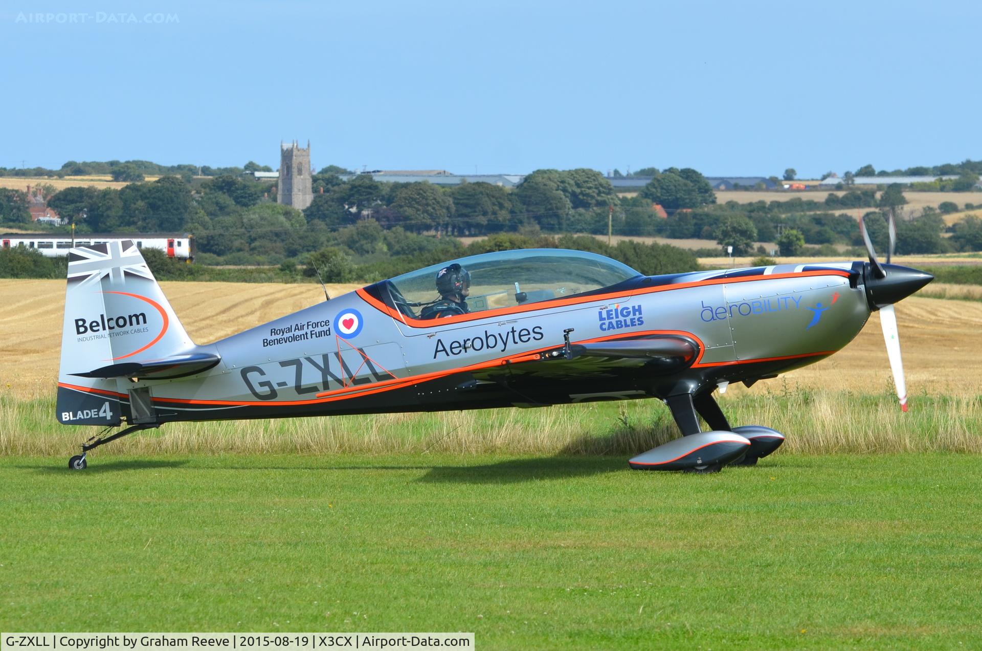 G-ZXLL, 2011 Extra EA-300L C/N 1319, One of the Blades, just landed at Northrepps.