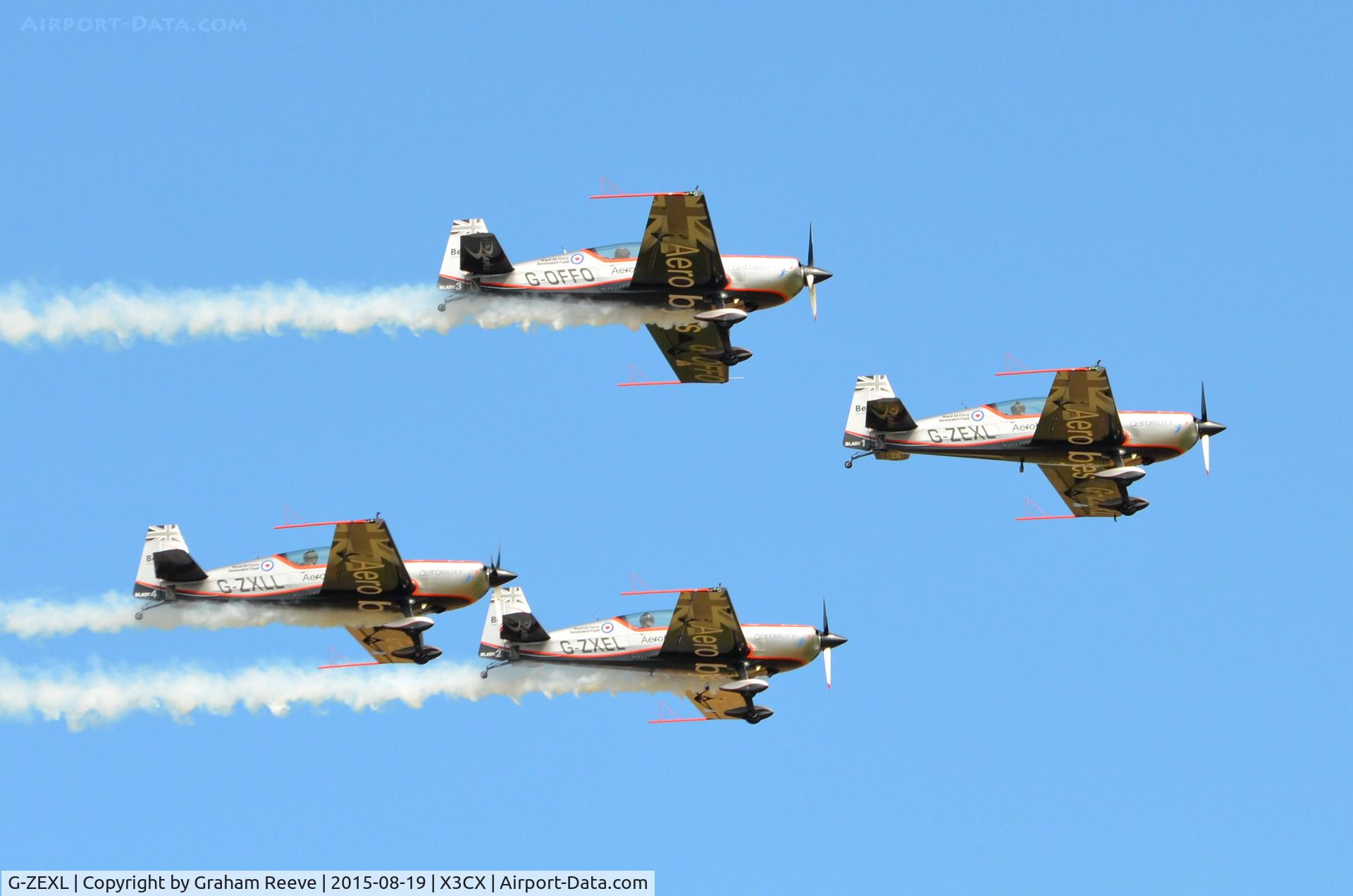 G-ZEXL, 2006 Extra EA-300L C/N 1225, The Blades aerobatic team over Northrepps.