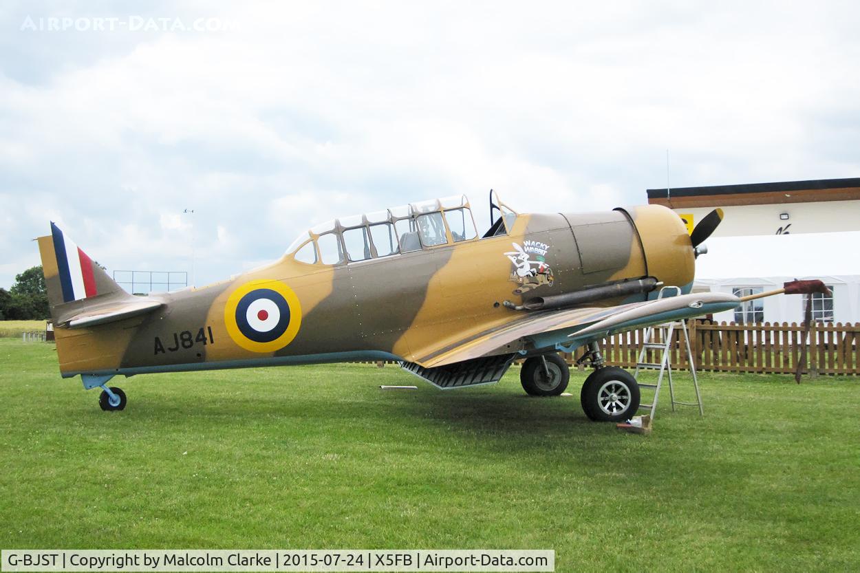 G-BJST, 1953 Canadian Car & Foundry T-6H Harvard Mk.4M C/N 14A-2429, Canadian Car & Foundry T-6H Harvard Mk4M in new camouflage finish by RS Paintworks at Fishburn Airfield awaiting her rudder to complete. July 24th 2015.