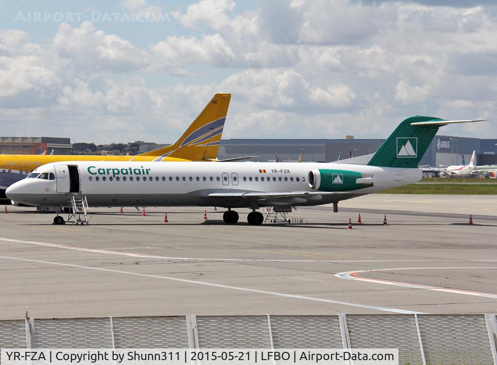 YR-FZA, 1992 Fokker 100 (F-28-0100) C/N 11395, Parked at the General Aviation area...