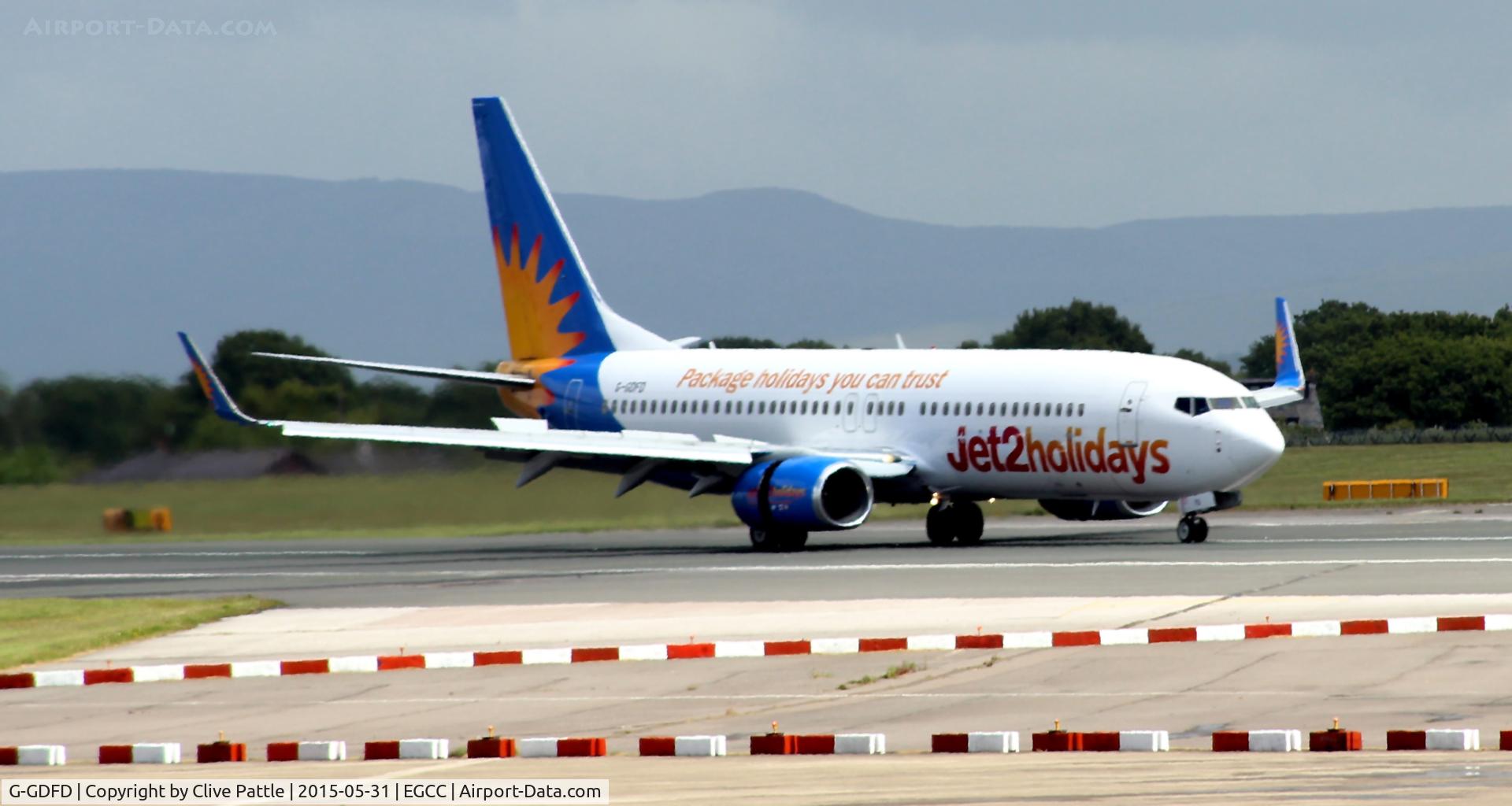 G-GDFD, 1997 Boeing 737-8K5 C/N 27982, Landing roll at EGCC