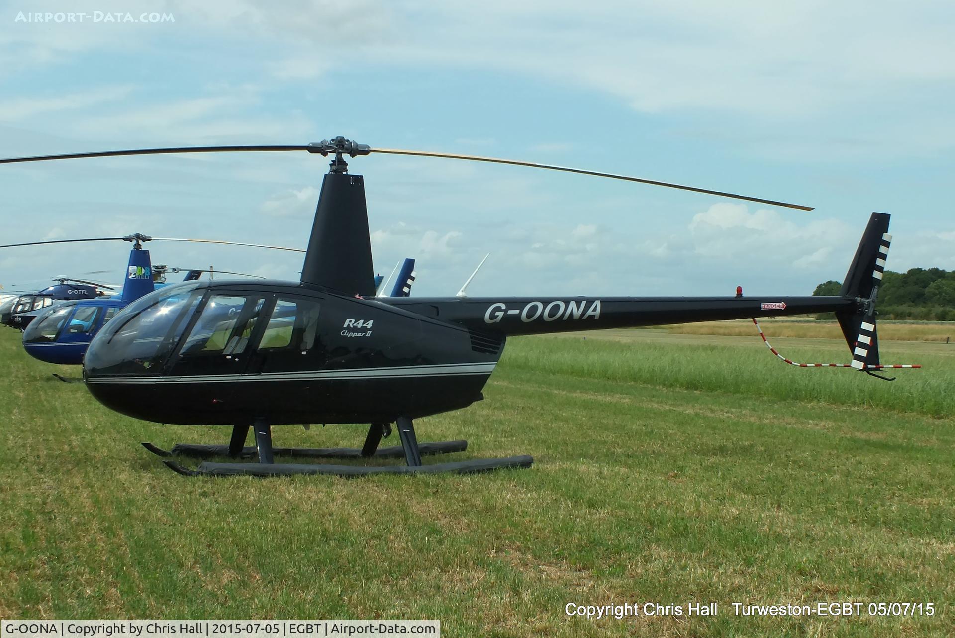 G-OONA, 2005 Robinson R44 Clipper II C/N 10907, ferrying race fans to the British F1 Grand Prix at Silverstone