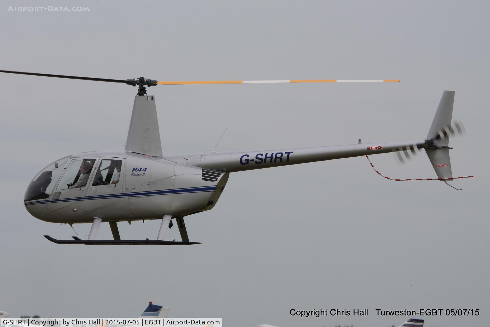 G-SHRT, 2004 Robinson R44 II C/N 10473, ferrying race fans to the British F1 Grand Prix at Silverstone