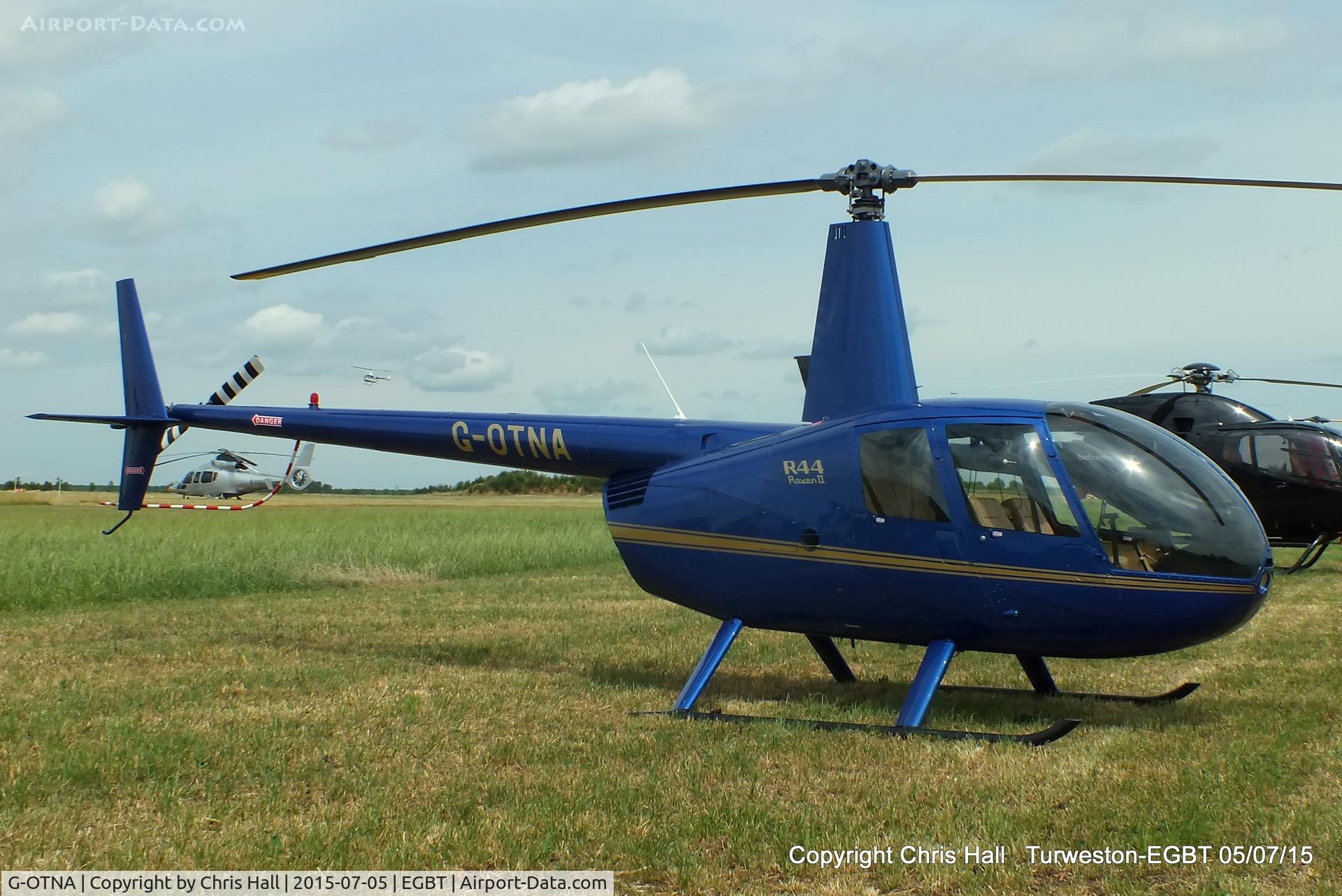 G-OTNA, 2006 Robinson R44 Raven II C/N 11092, ferrying race fans to the British F1 Grand Prix at Silverstone