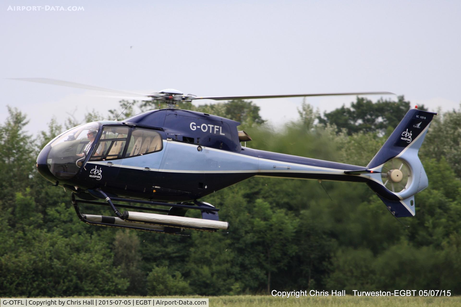 G-OTFL, 1999 Eurocopter EC-120B Colibri C/N 1073, ferrying race fans to the British F1 Grand Prix at Silverstone