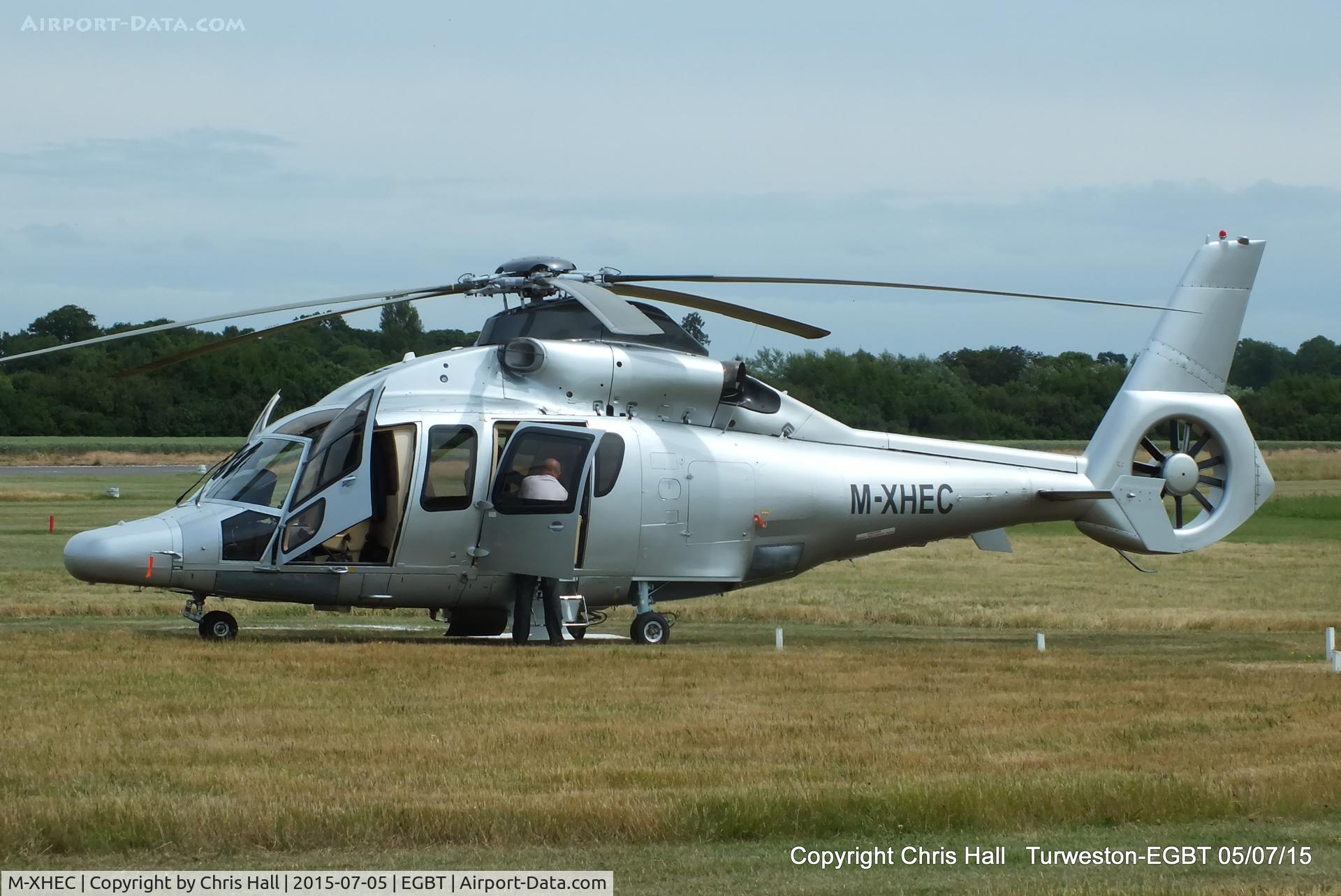 M-XHEC, Eurocopter EC-155B C/N 6600, ferrying race fans to the British F1 Grand Prix at Silverstone