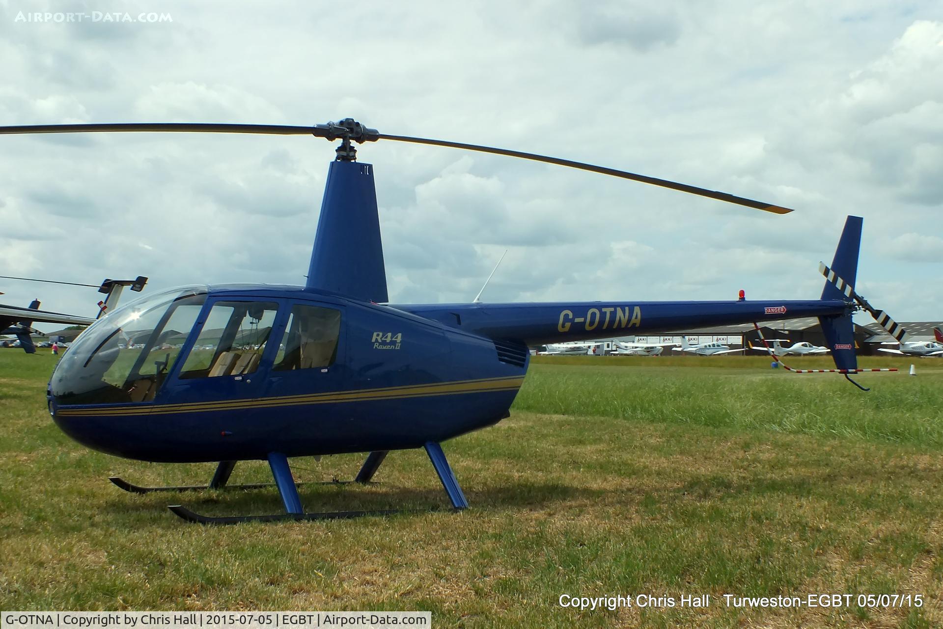 G-OTNA, 2006 Robinson R44 Raven II C/N 11092, ferrying race fans to the British F1 Grand Prix at Silverstone