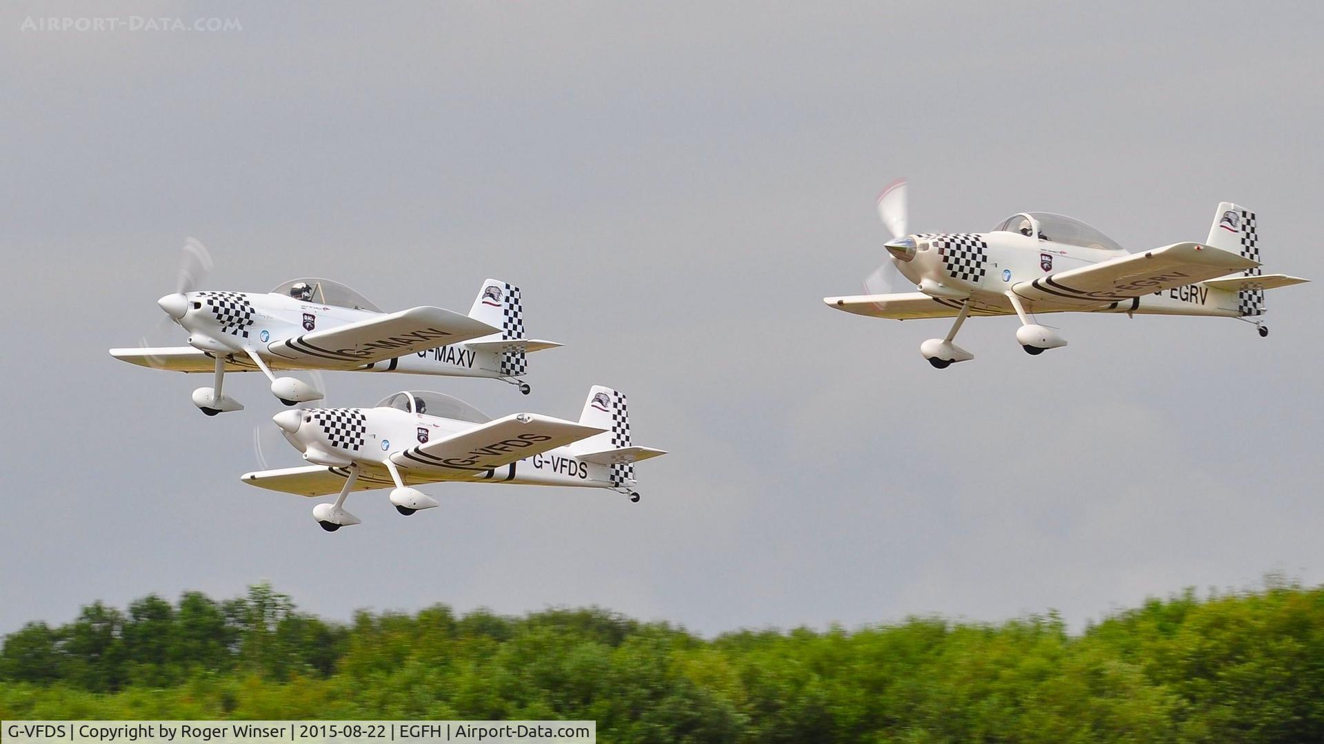 G-VFDS, 2012 Vans RV-8 C/N PFA 303-14637, Raven 2 of Team Raven. Departing Runway 22 to display at the Dawlish Air Show. Ravens 4 and 5 are out of shot.