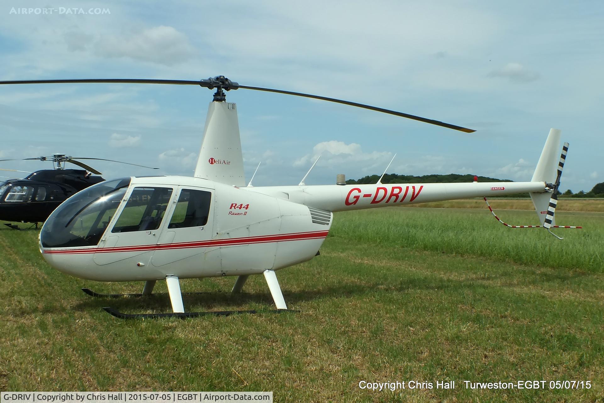 G-DRIV, 2003 Robinson R44 Raven II C/N 10126, ferrying race fans to the British F1 Grand Prix at Silverstone