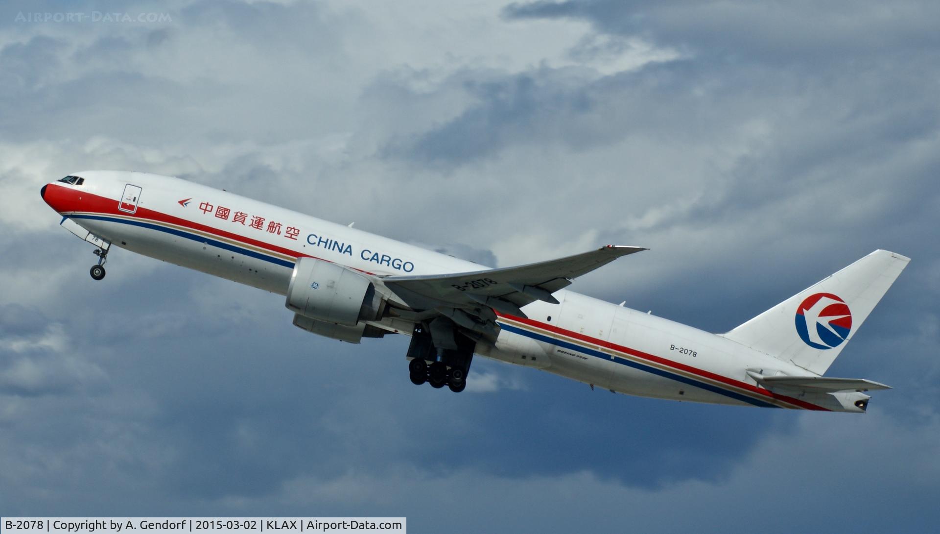 B-2078, 2010 Boeing 777-F6N C/N 37714, China Cargo Airlines, is here climbing out at Los Angeles Int'l(KLAX)