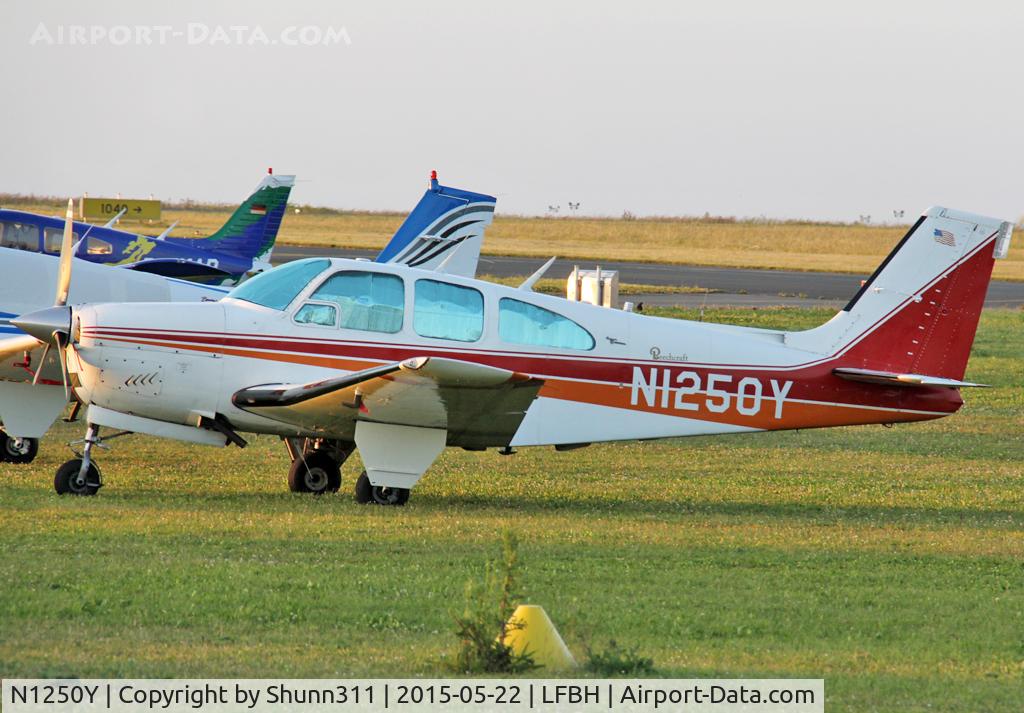 N1250Y, 1966 Beech 35-C33 Debonair C/N CD-1039, Parked on the grass...