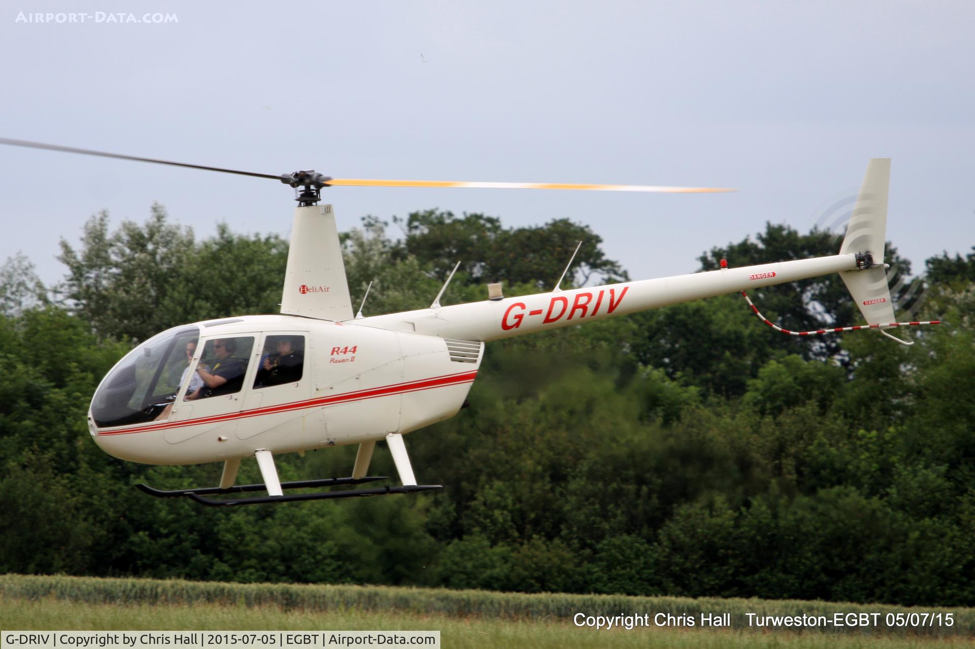 G-DRIV, 2003 Robinson R44 Raven II C/N 10126, ferrying race fans to the British F1 Grand Prix at Silverstone