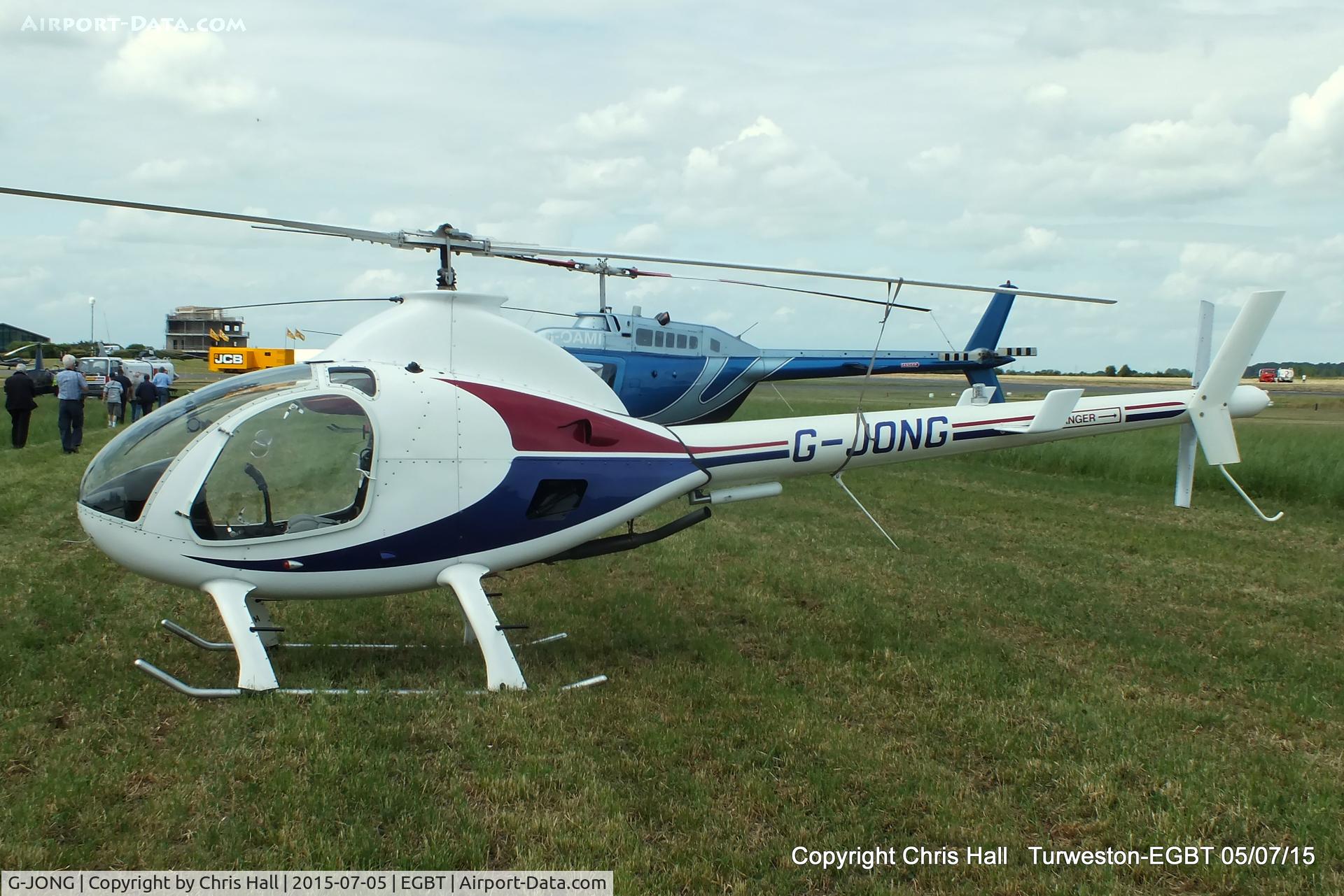 G-JONG, 2004 Rotorway Exec 162F C/N 6168, ferrying race fans to the British F1 Grand Prix at Silverstone