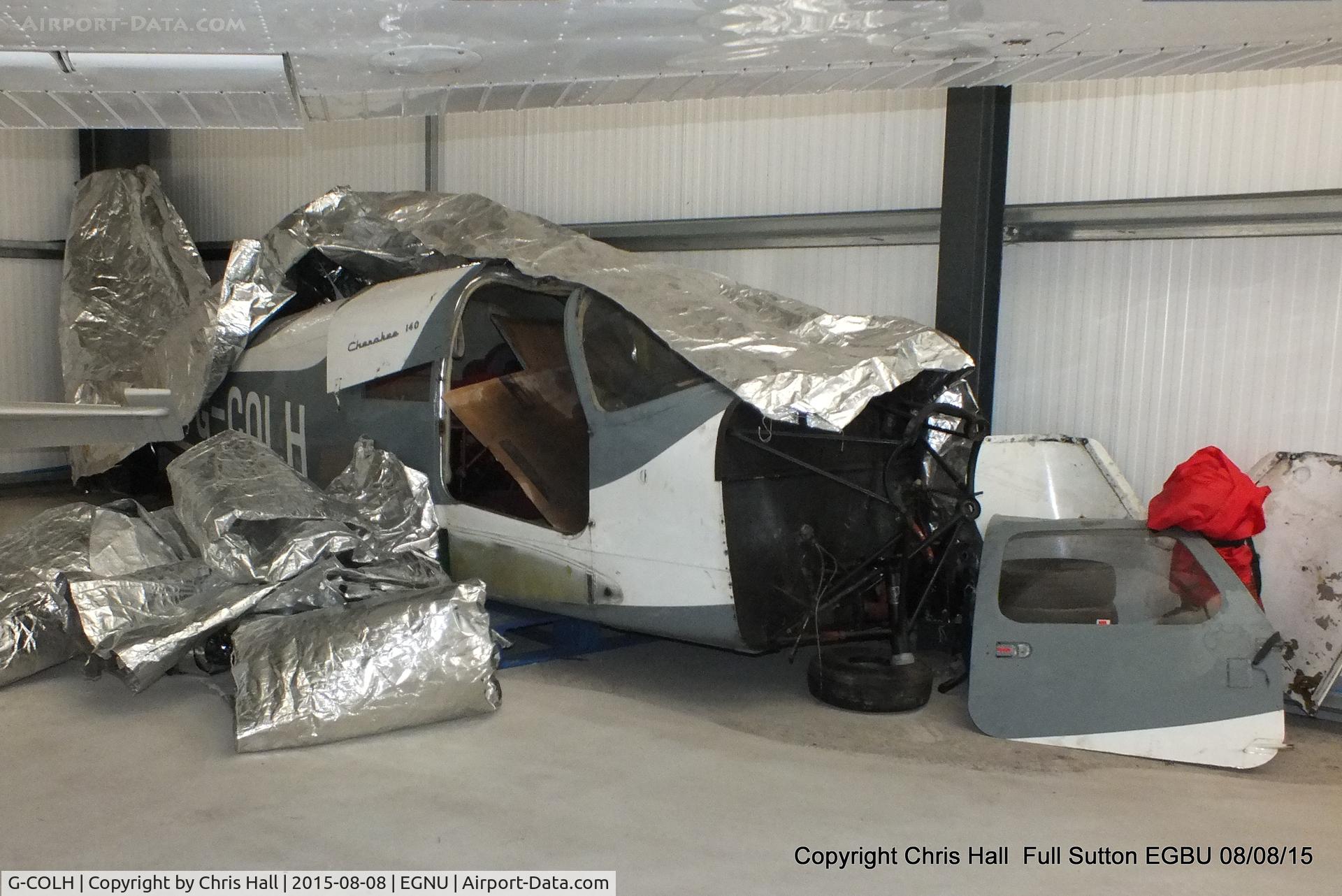 G-COLH, 1967 Piper PA-28-140 Cherokee C/N 28-23143, stored in a hangar at Full Sutton