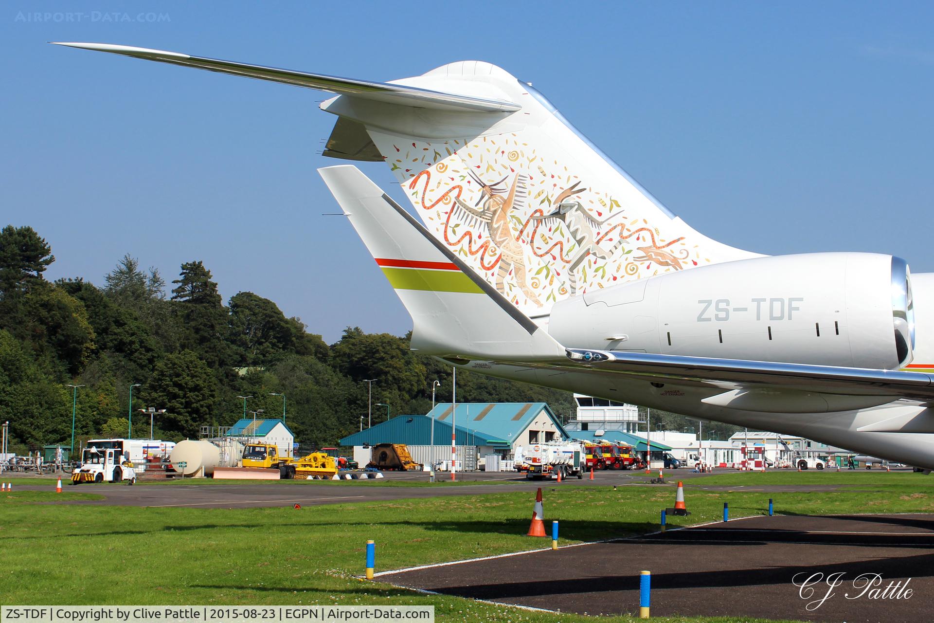 ZS-TDF, 2014 Bombardier BD-700-1A10 Global 6000 C/N 9603, Close-up tail detail whilst parked up at Dundee Riverside airport EGPN