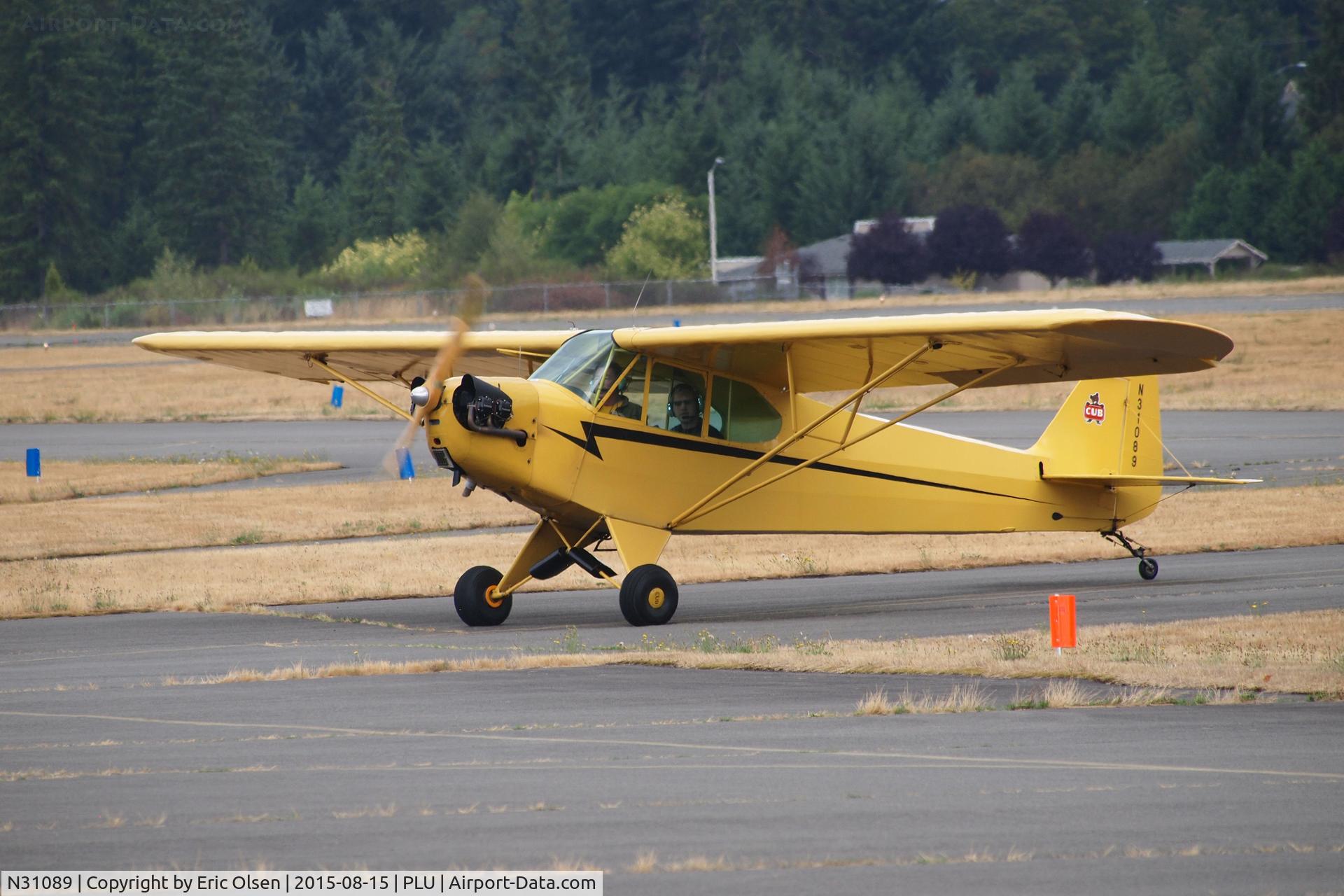N31089, 1940 Piper J3L-65 Cub C/N 5315, 1940 Piper taxing in after landing for Cubs and Classics.