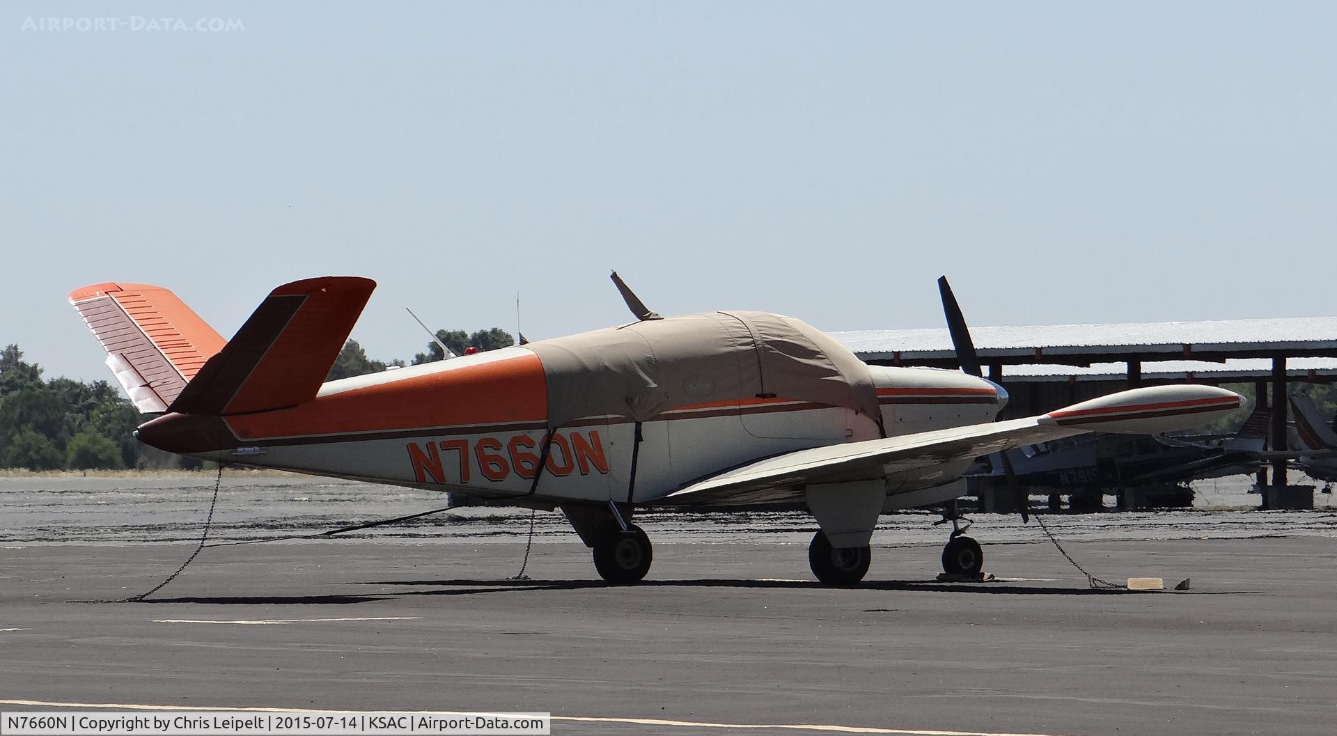 N7660N, 1957 Beech J35 Bonanza C/N D-5669, Locally based 1957 Beechcraft Bonanza J35 sitting on the hot ramp at Sacramento Executive Airport, Sacramento, CA.