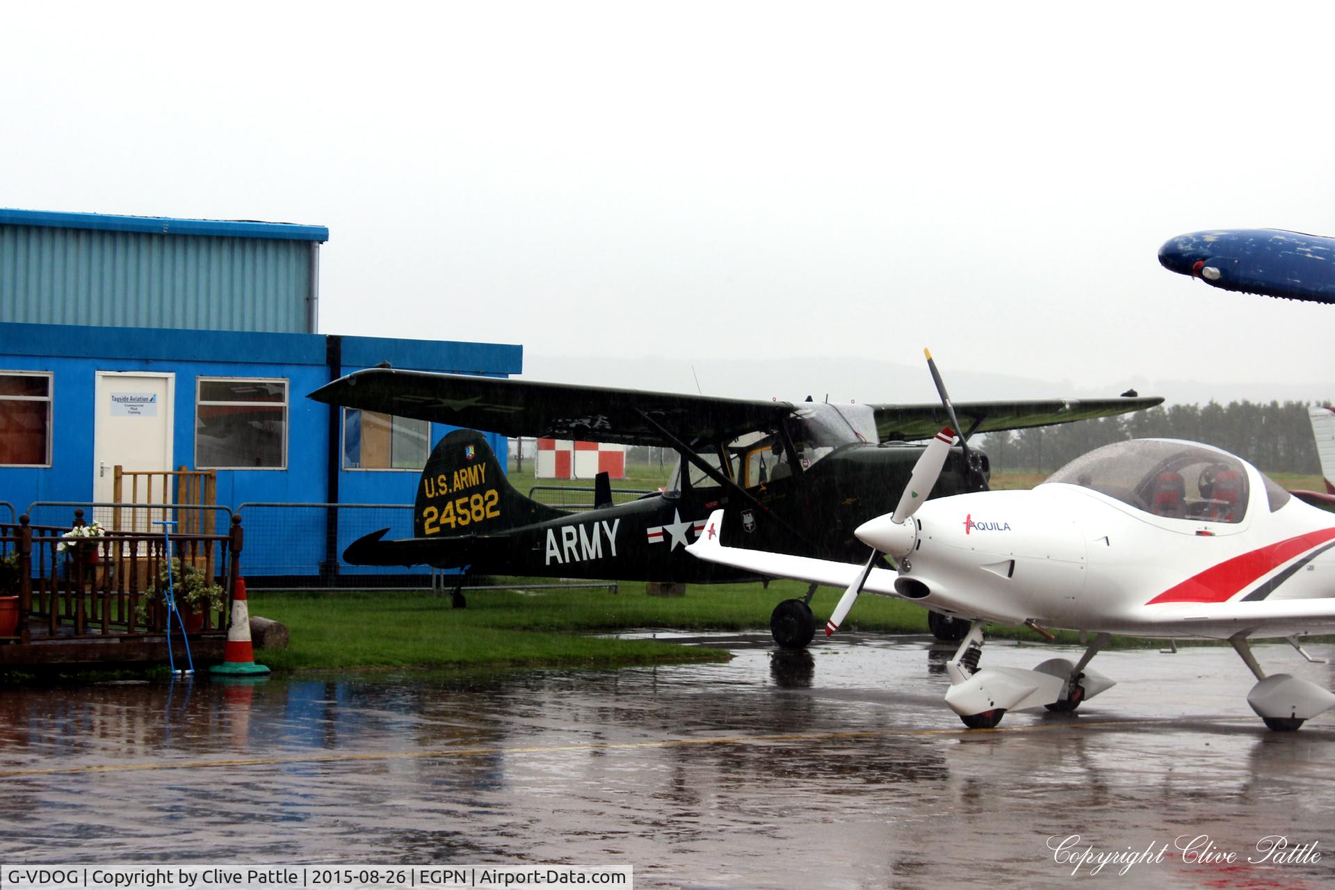 G-VDOG, 1958 Cessna O-1E Bird Dog C/N 24582, Introducing a new resident based at Dundee Riverside airport EGPN. Taken in cramped conditions with awful weather.