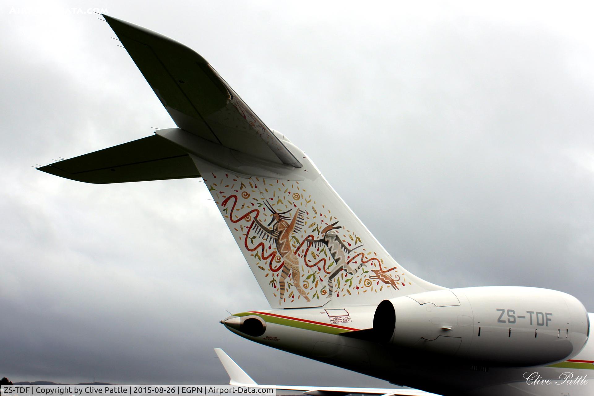 ZS-TDF, 2014 Bombardier BD-700-1A10 Global 6000 C/N 9603, A close-up of the amazing artwork on the tail of 'TDF' whilst parked at Dundee Riverside Airport EGPN.