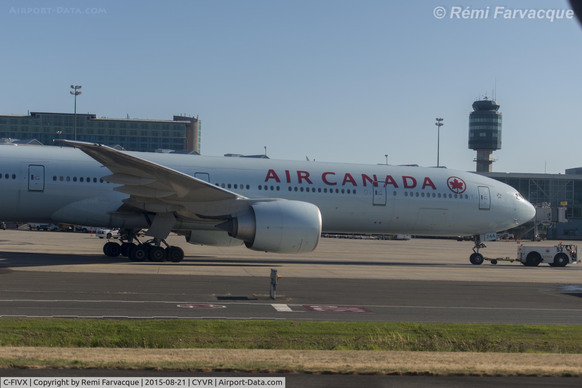 C-FIVX, 2013 Boeing 777-333/ER C/N 42219, Front end, second of two pics - didn't have a wider angle lens with me at the time, but at least you get detail ! Apologies for the poor quality of the image, was taken from another craft with badly scratched windows.
