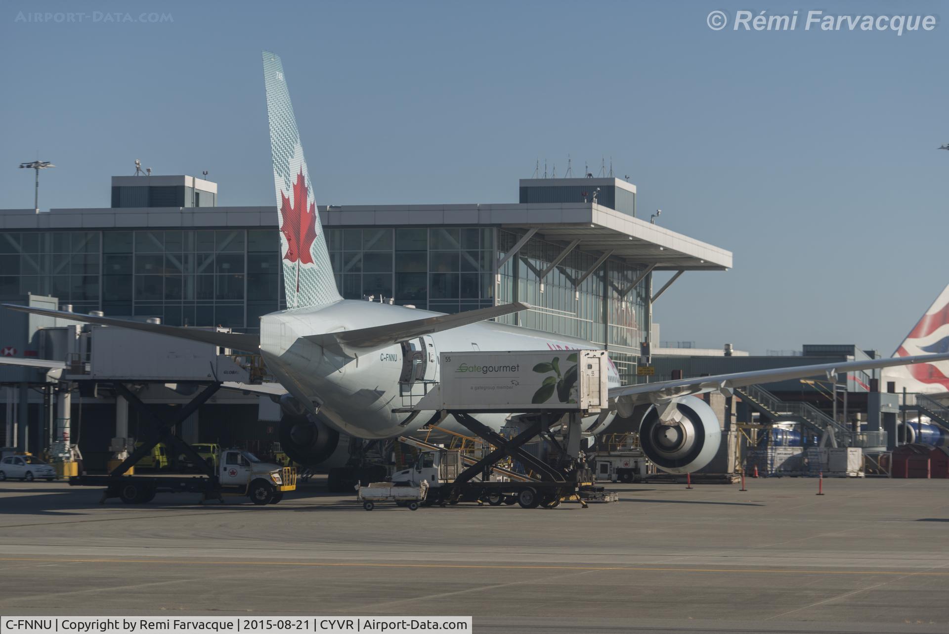 C-FNNU, 2013 Boeing 777-333/ER C/N 43249, Apologies for the poor quality of the image, I was shooting through badly scratched windows of another craft.
