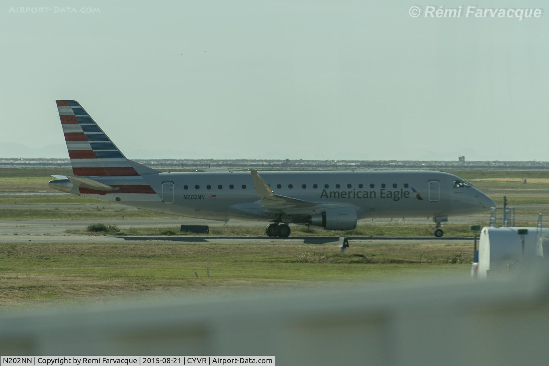 N202NN, 2015 Embraer 175LR (ERJ-170-200LR) C/N 17000467, Taxiing to gates after arriving.