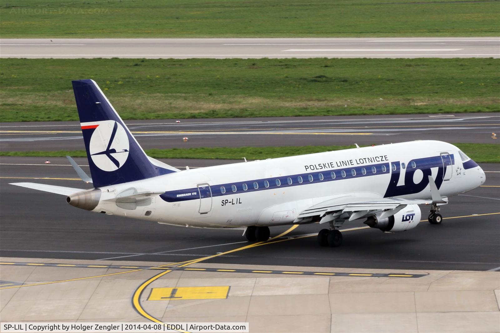 SP-LIL, 2010 Embraer 175LR (ERJ-170-200LR) C/N 17000306, Leaving apron for return to WAW...