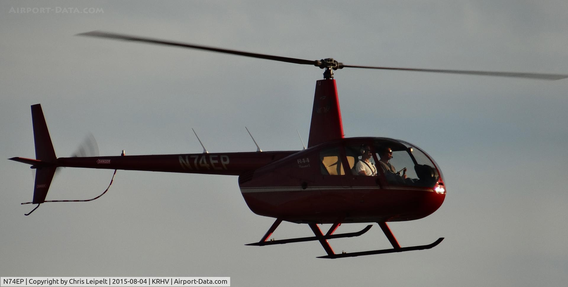 N74EP, 2013 Robinson R44 C/N 2301, Wings and Wheels LLC (Atherton, CA) 2013 Robinson R44 doing stop and goes on runway 31L at Reid Hillview Airport, San Jose, CA.
