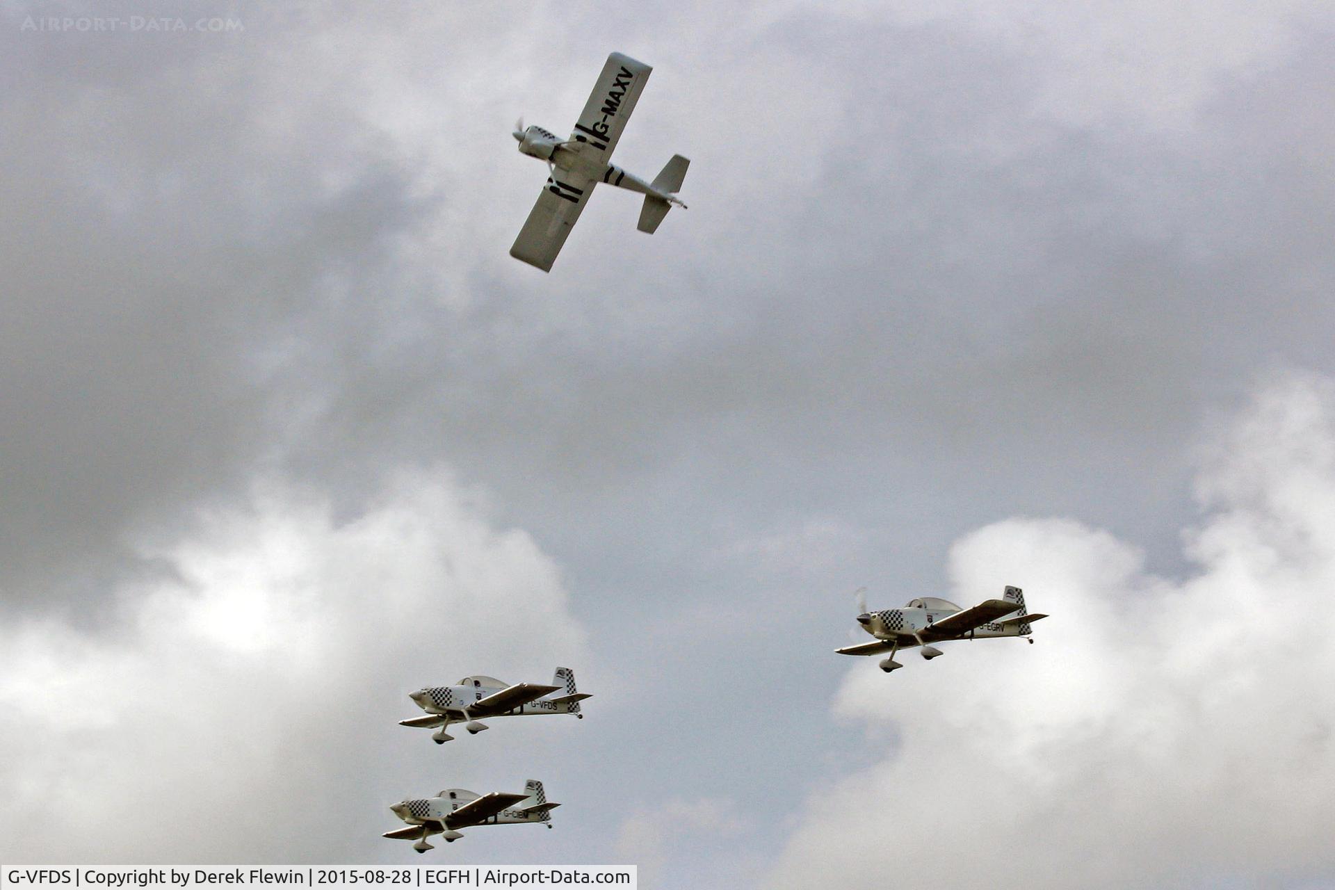 G-VFDS, 2012 Vans RV-8 C/N PFA 303-14637, RV-8, EGFH resident Team Raven, seen returning from the 2015 Clacton Air Show, run and break runway 22, also in the shot are G-MAXV, G-EGRV, G-CIBM.