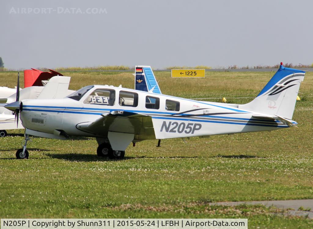 N205P, Raytheon Aircraft Company A36 Bonanza C/N E-3625, Parked on the grass...