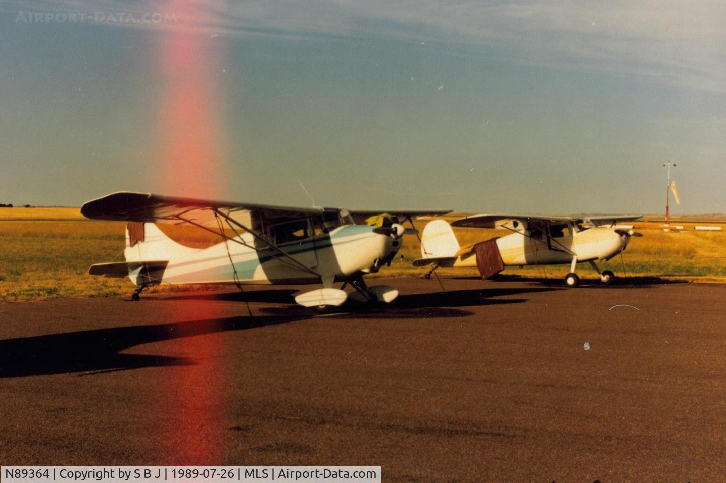 N89364, 1946 Cessna 140 C/N 8396, 364 trying to dry out after a very wet night at Miles City,Mt.