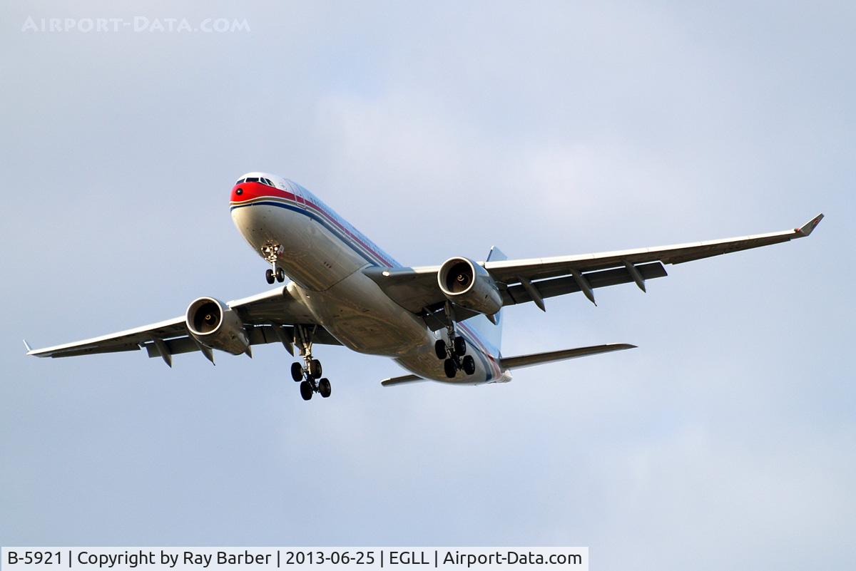 B-5921, 2013 Airbus A330-243 C/N 1402, Airbus A330-243 [1402] (China Eastern Airlines) Home~G 25/06/2013. On approach 27R.