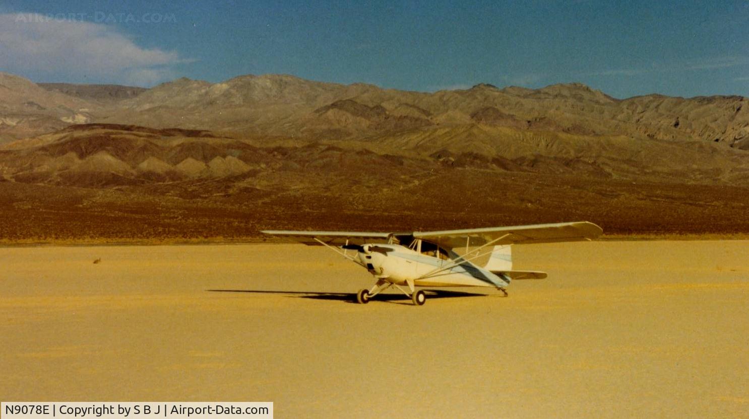 N9078E, 1946 Aeronca 11AC Chief C/N 11AC-710, 78E on Panamint dry lake (is now part of Death Valley) with Death Valley over the mountains behind 78E.