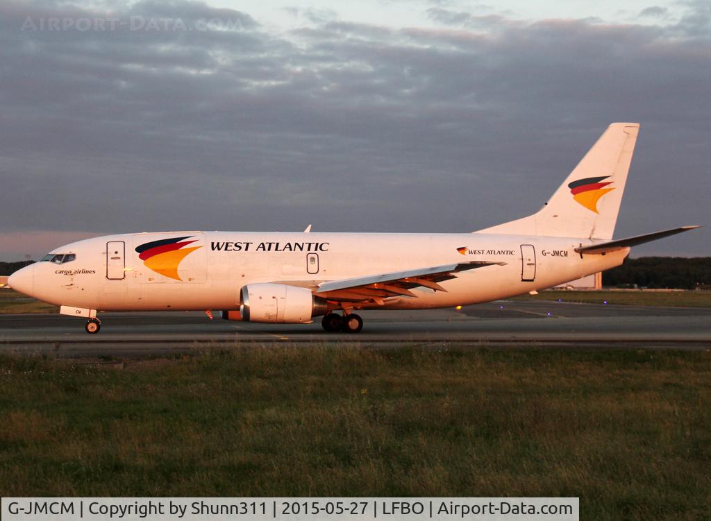 G-JMCM, 1990 Boeing 737-3Y0/SF C/N 24679, Taxiing to the Cargo area...