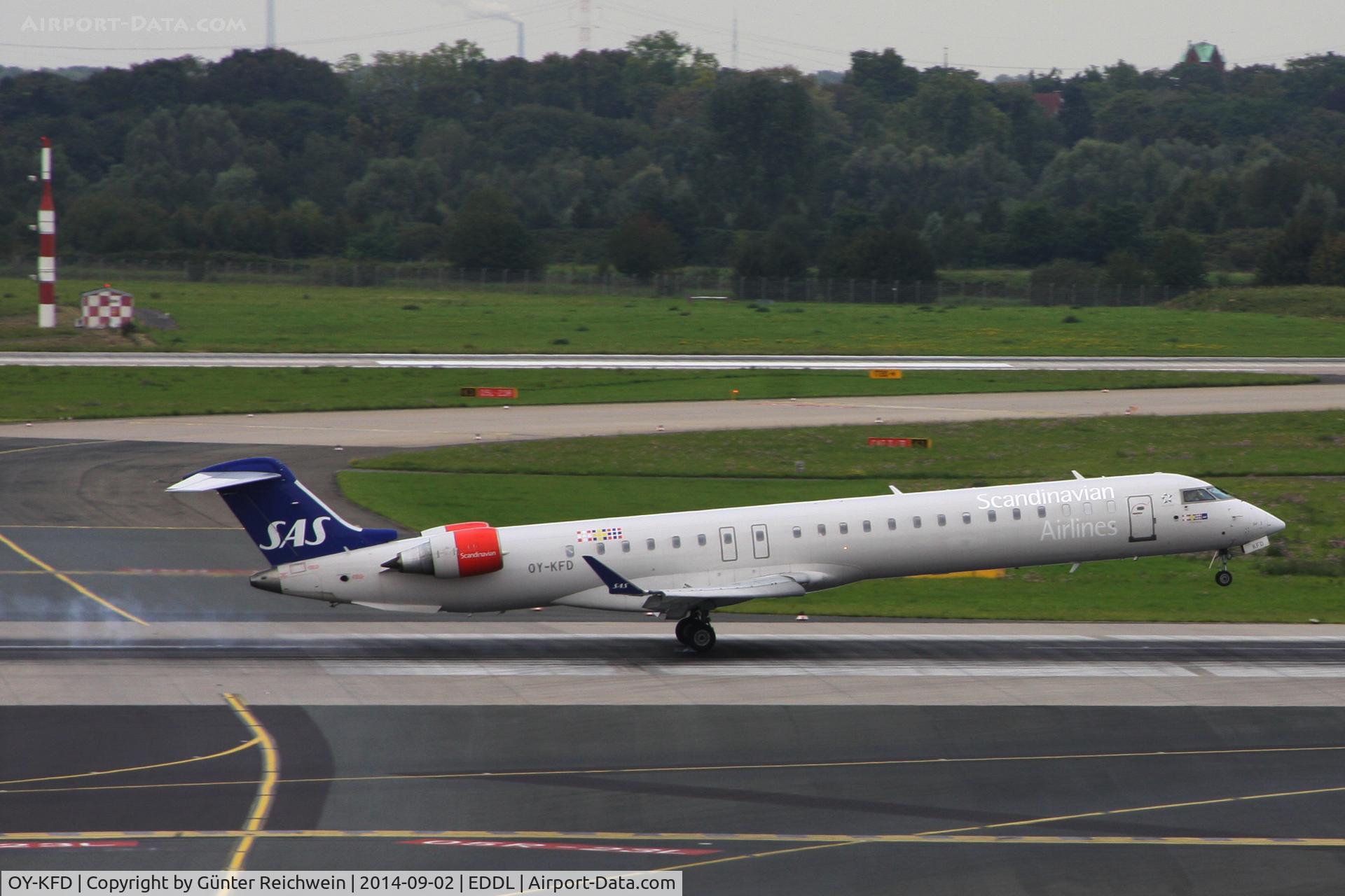 OY-KFD, 2009 Bombardier CRJ-900 (CL-600-2D24) C/N 15221, Arriving - touch down