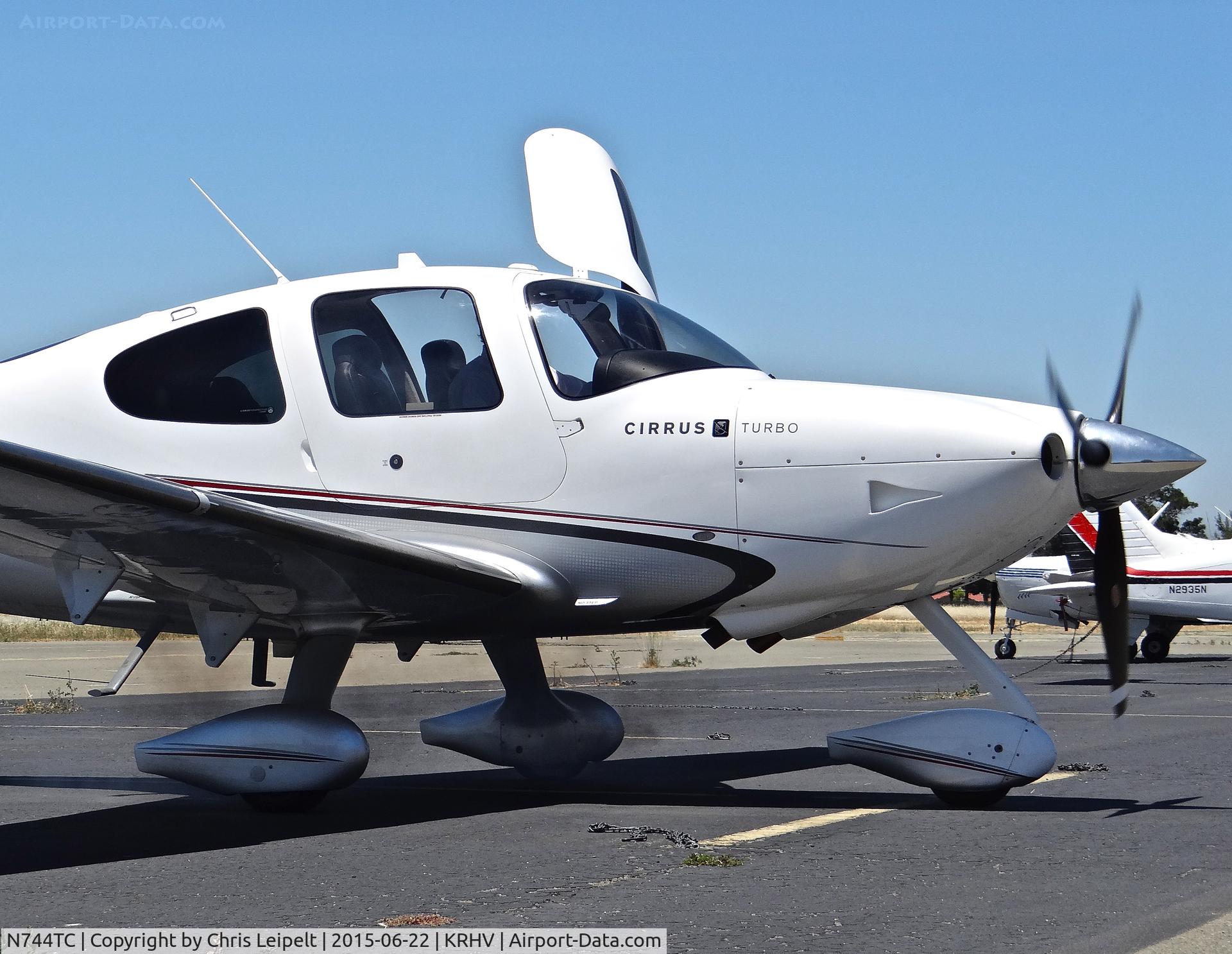 N744TC, 2007 Cirrus SR22 X Turbo C/N 2831, Sterling Silver Aviation LLC (Monte Sereno, CA) 2007 Cirrus SR22 puffing out smoke while starting up at Reid Hillview Airport, San Jose, CA. I bumped up the definition to make the smoke easier to see.