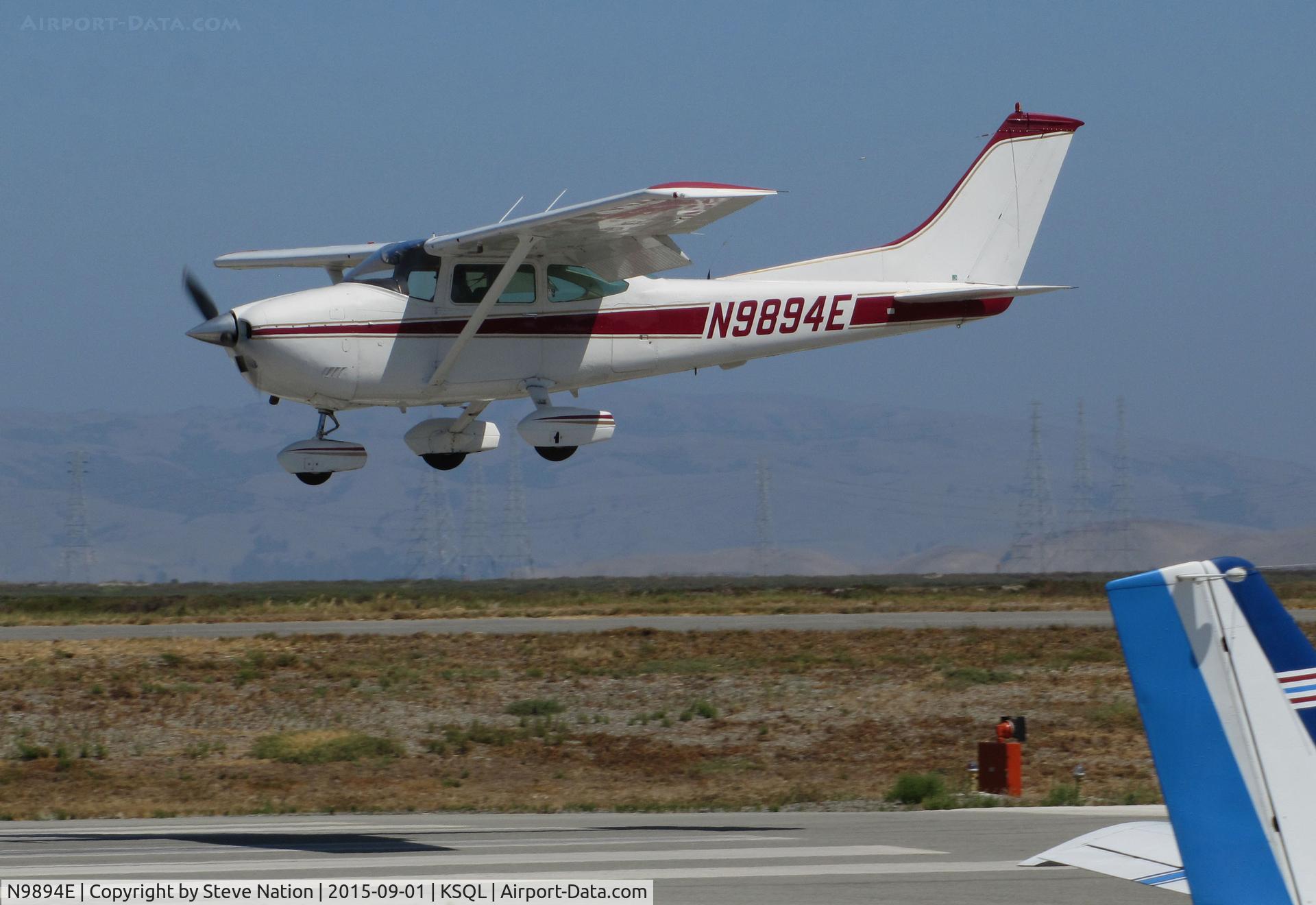 N9894E, 1975 Cessna 182P Skylane C/N 18263955, 1975 Cessna 182P landing @ San Carlos Airport, CA
