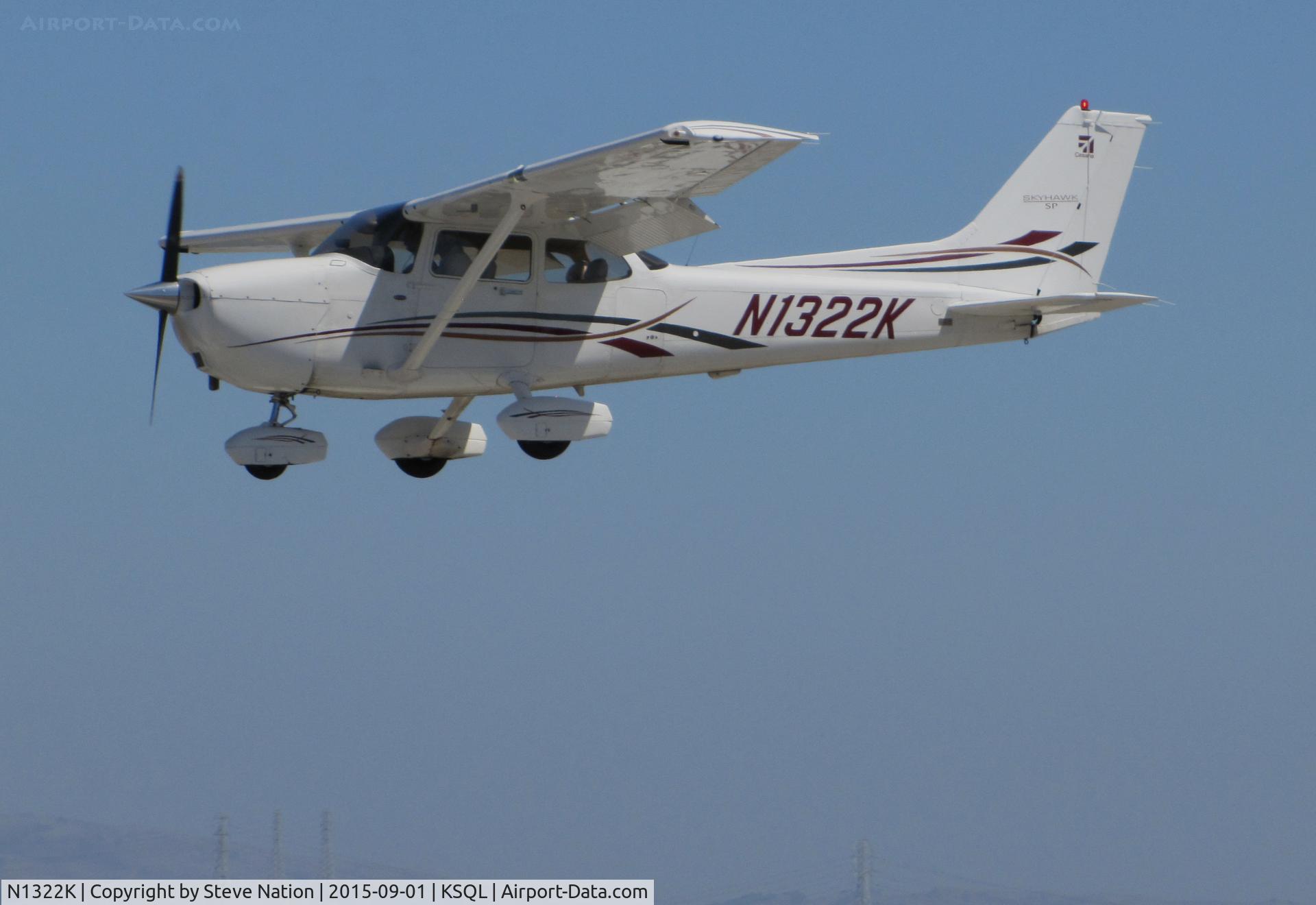 N1322K, 2006 Cessna 172S C/N 172S10345, 2006 Cessna 172S over the threshold @ San Carlos Airport, CA