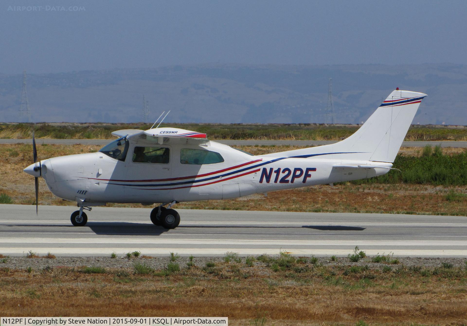 N12PF, 1977 Cessna T210M Turbo Centurion C/N 21062401, Locally-based Cessna T210M taking off @ San Carlos Airport, CA
