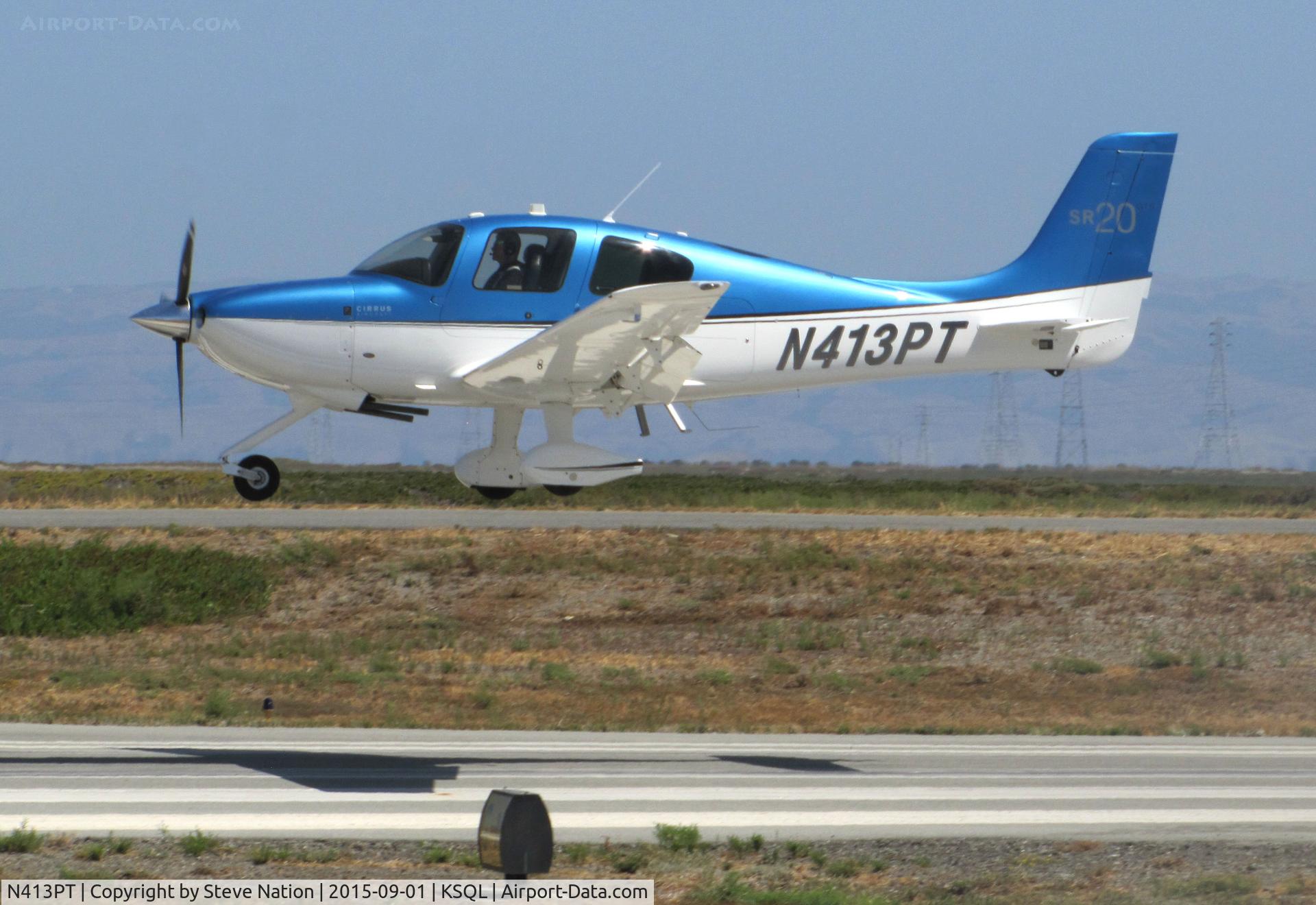 N413PT, Cirrus SR20 GTS C/N 2133, 2012 Cirrus SR20 over the threshold @ San Carlos Airport, CA